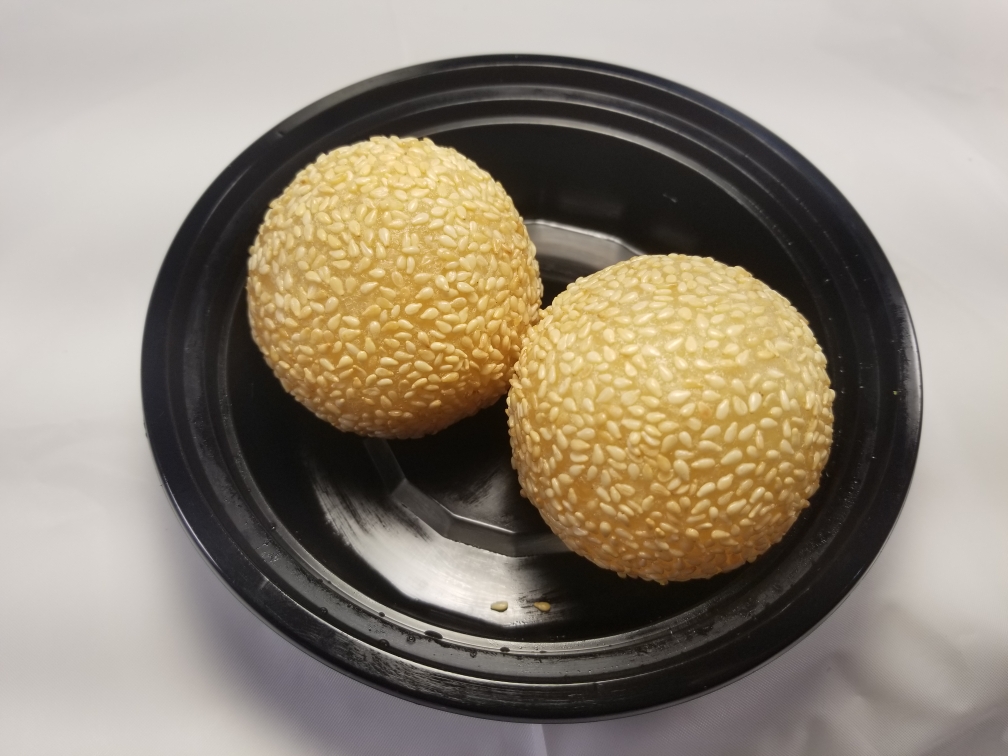 Order Sesame Ball (2pcs.) food online from Lucky Deli store, Los Angeles on bringmethat.com