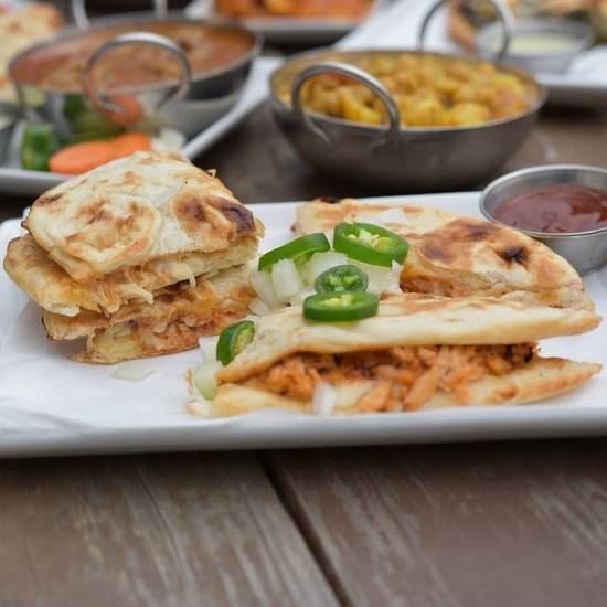 Order Naan 65 Quesadilla Ckn food online from Cowboys & Indians Tex-In Kitchen store, Houston on bringmethat.com