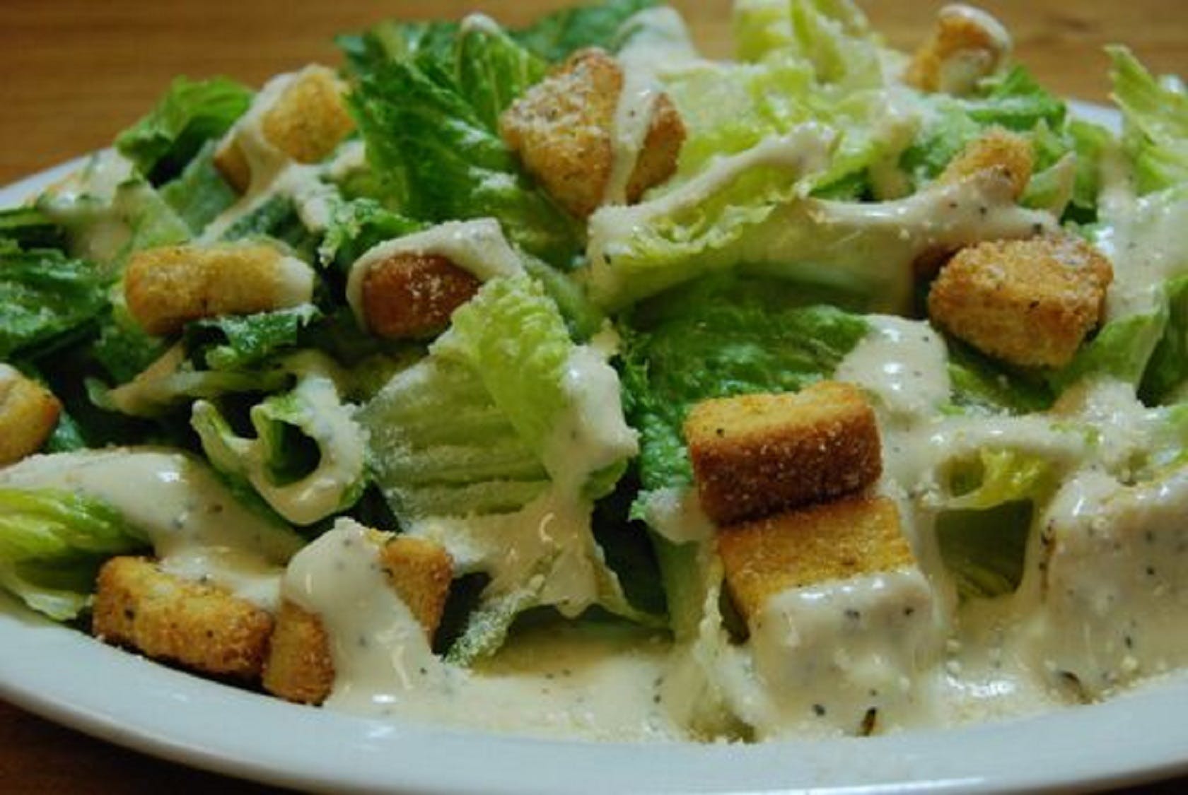 Order Caesar Salad - Salad food online from Stefano Pizza store, Petaluma on bringmethat.com