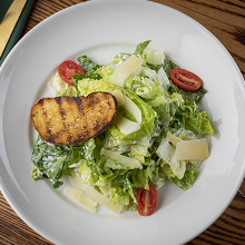 Order Caesar Salad food online from The Mirage Restaurant store, Schiller Park on bringmethat.com