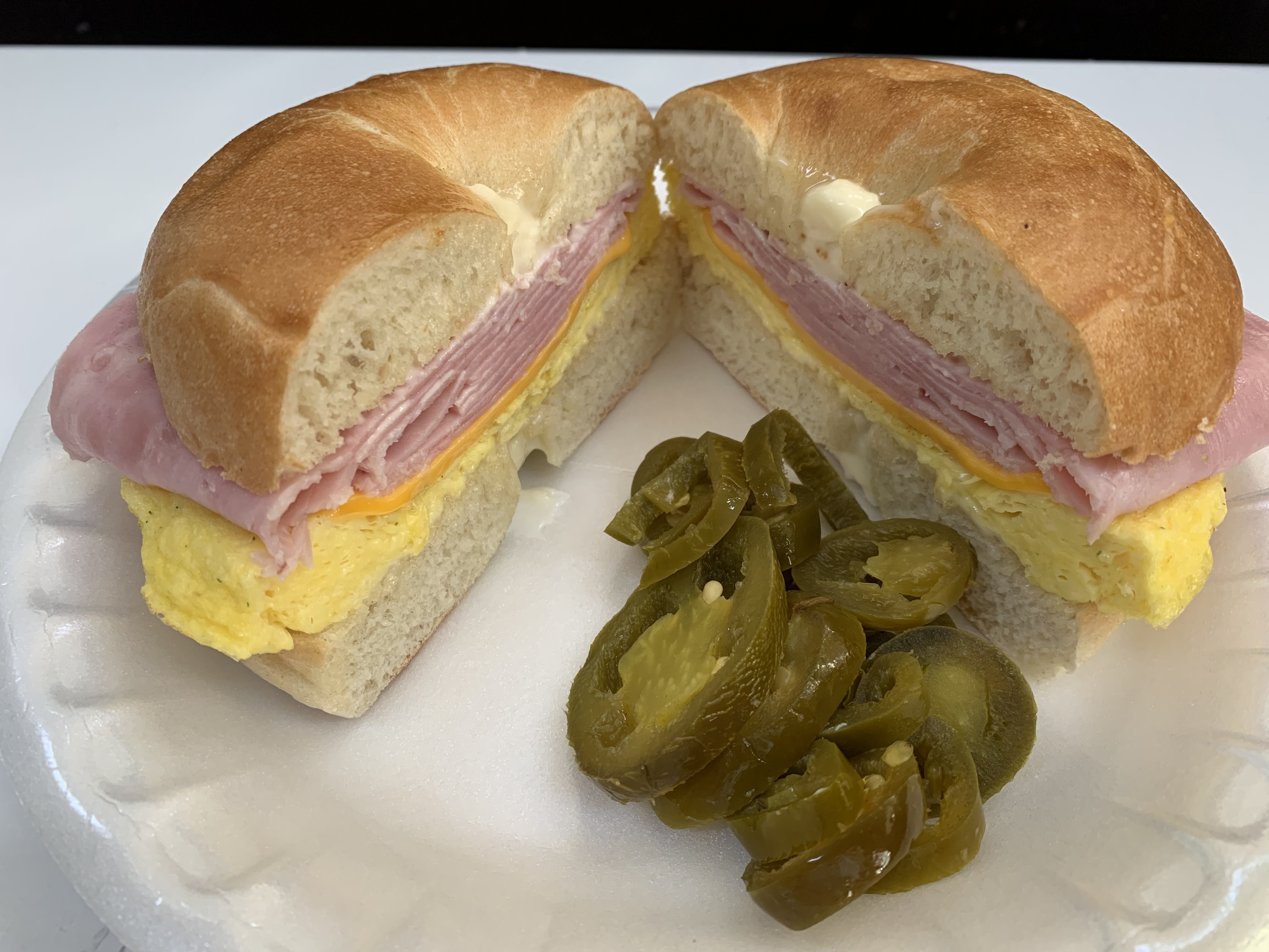 Order #17. Bagel with Ham, Egg and Cheese Sandwich food online from Donut Basket store, Modesto on bringmethat.com