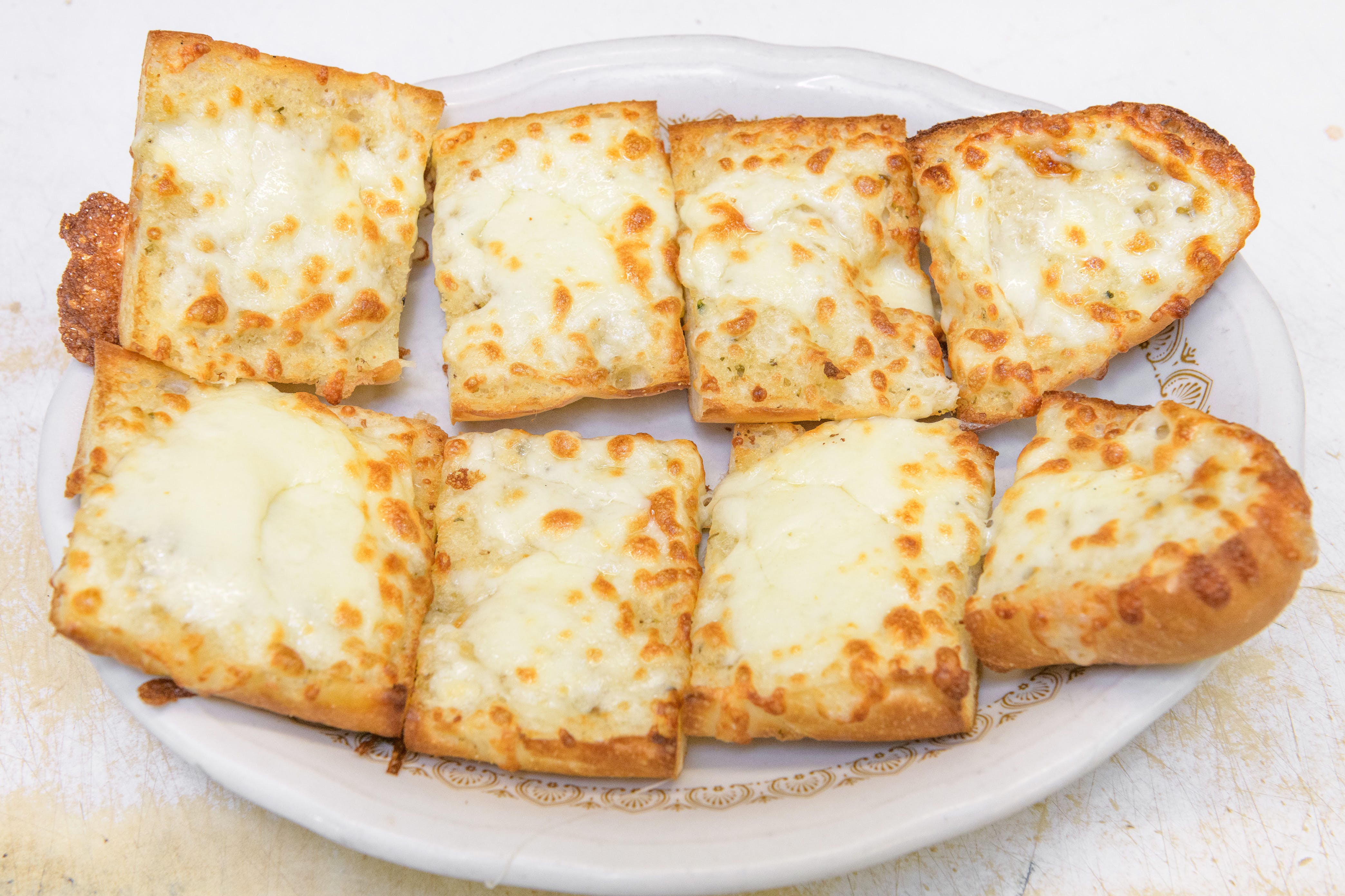Order Garlic Bread with Mozzarella Cheese - Appetizer food online from Mike's Apizza & Restaurant store, West Haven on bringmethat.com