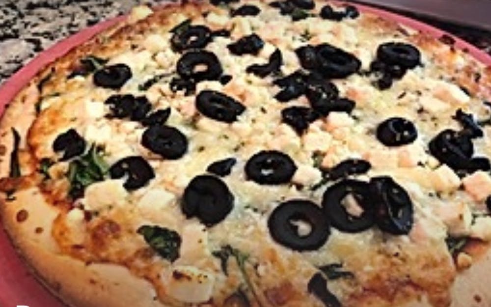 Order Greek Pizza - 10" food online from Singas Pizza store, Hicksville on bringmethat.com