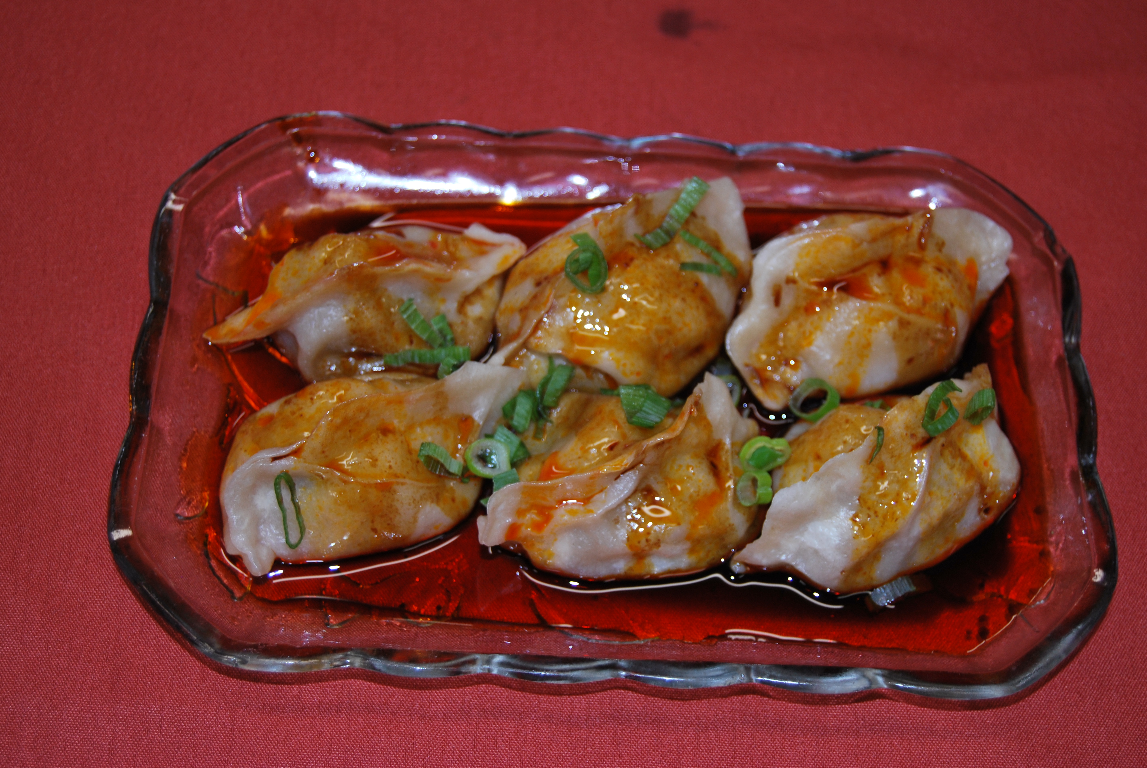 Order Dumpling with Red Chili Oil food online from Super Bowl Cuisine store, Kingston on bringmethat.com