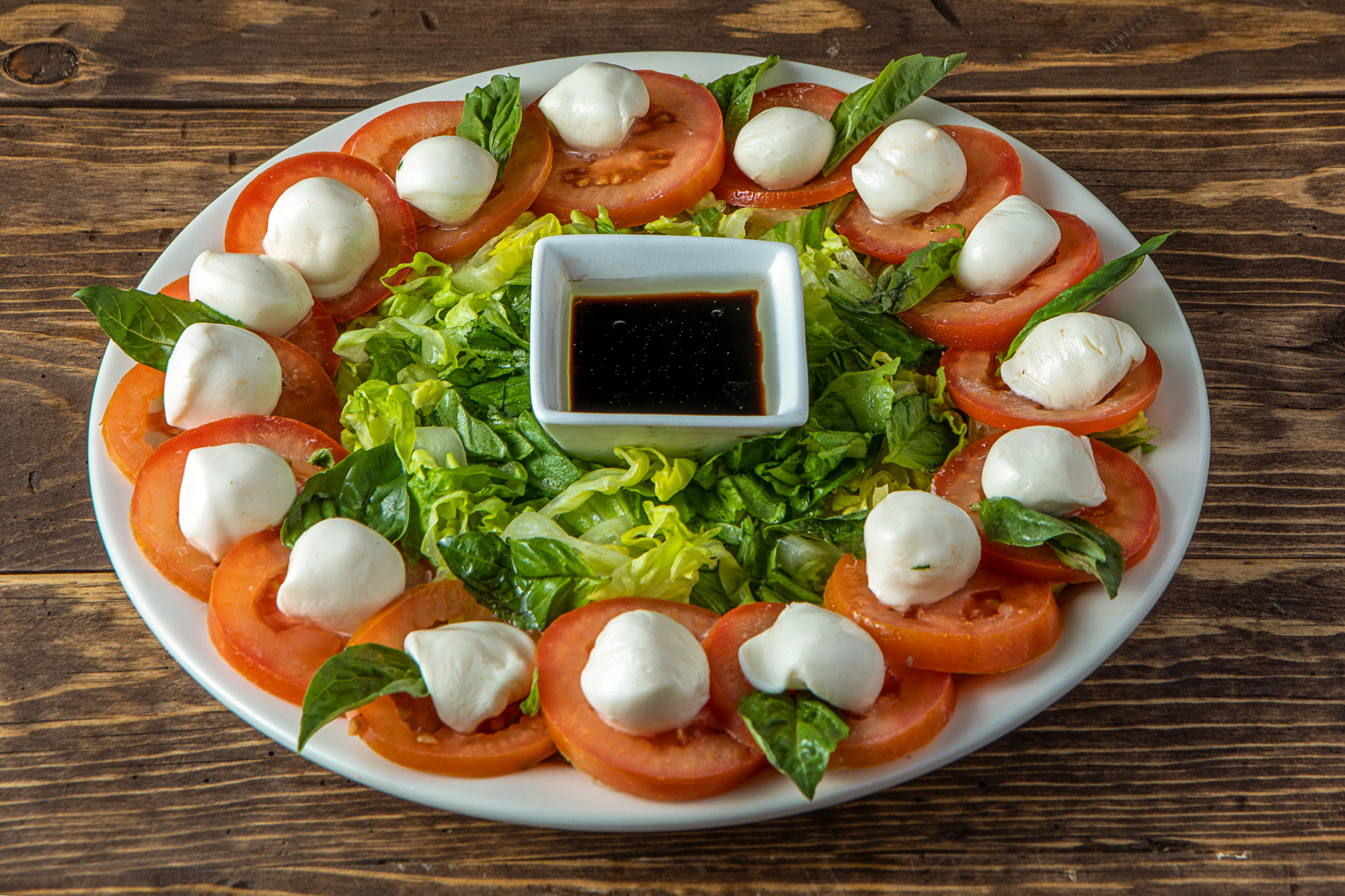 Order Capri Salad food online from Grand Pizza store, Las Vegas on bringmethat.com