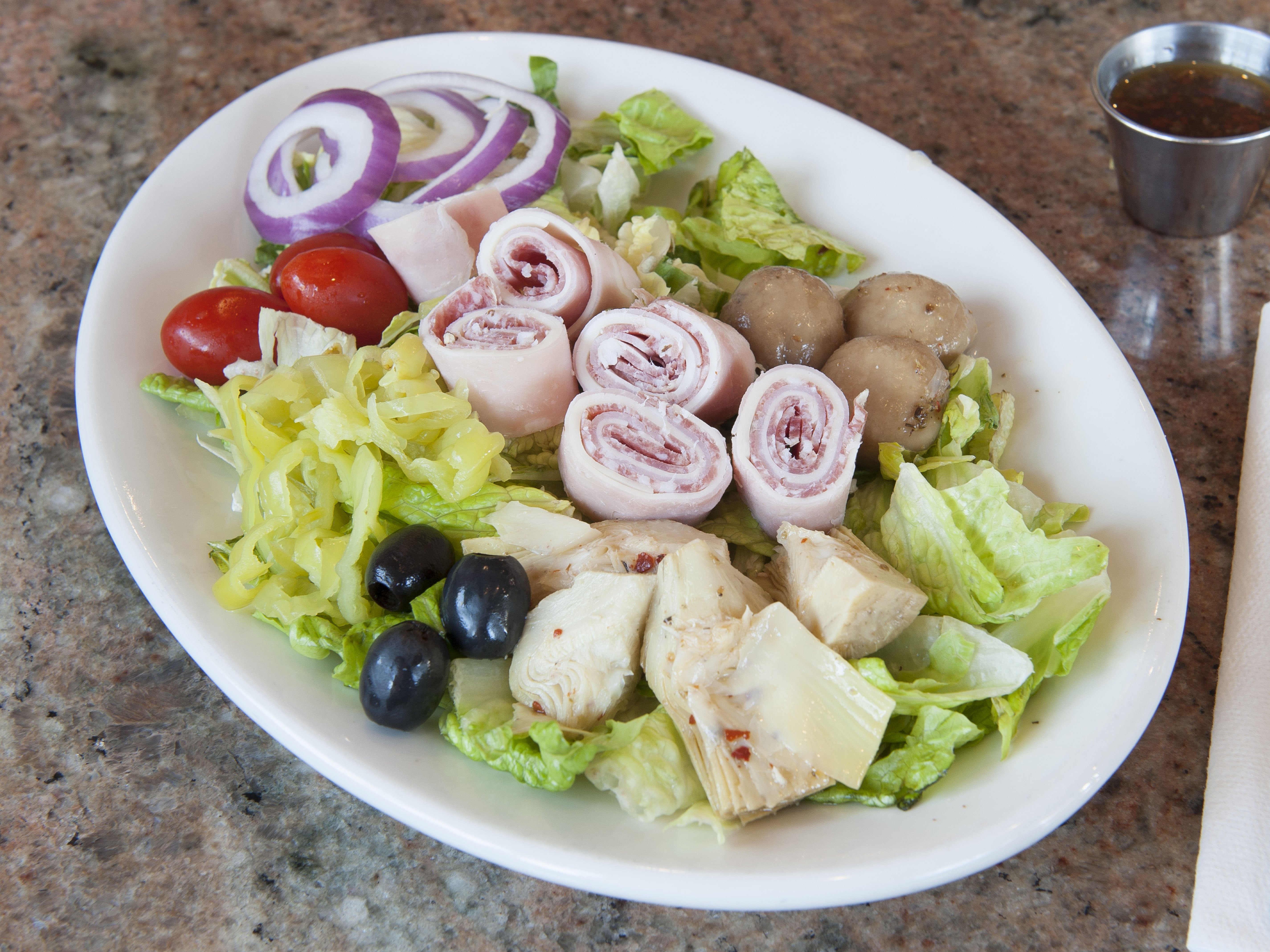 Order Antipasto Salad food online from Giuliano's Delicatessen and Bakery store, Torrance on bringmethat.com