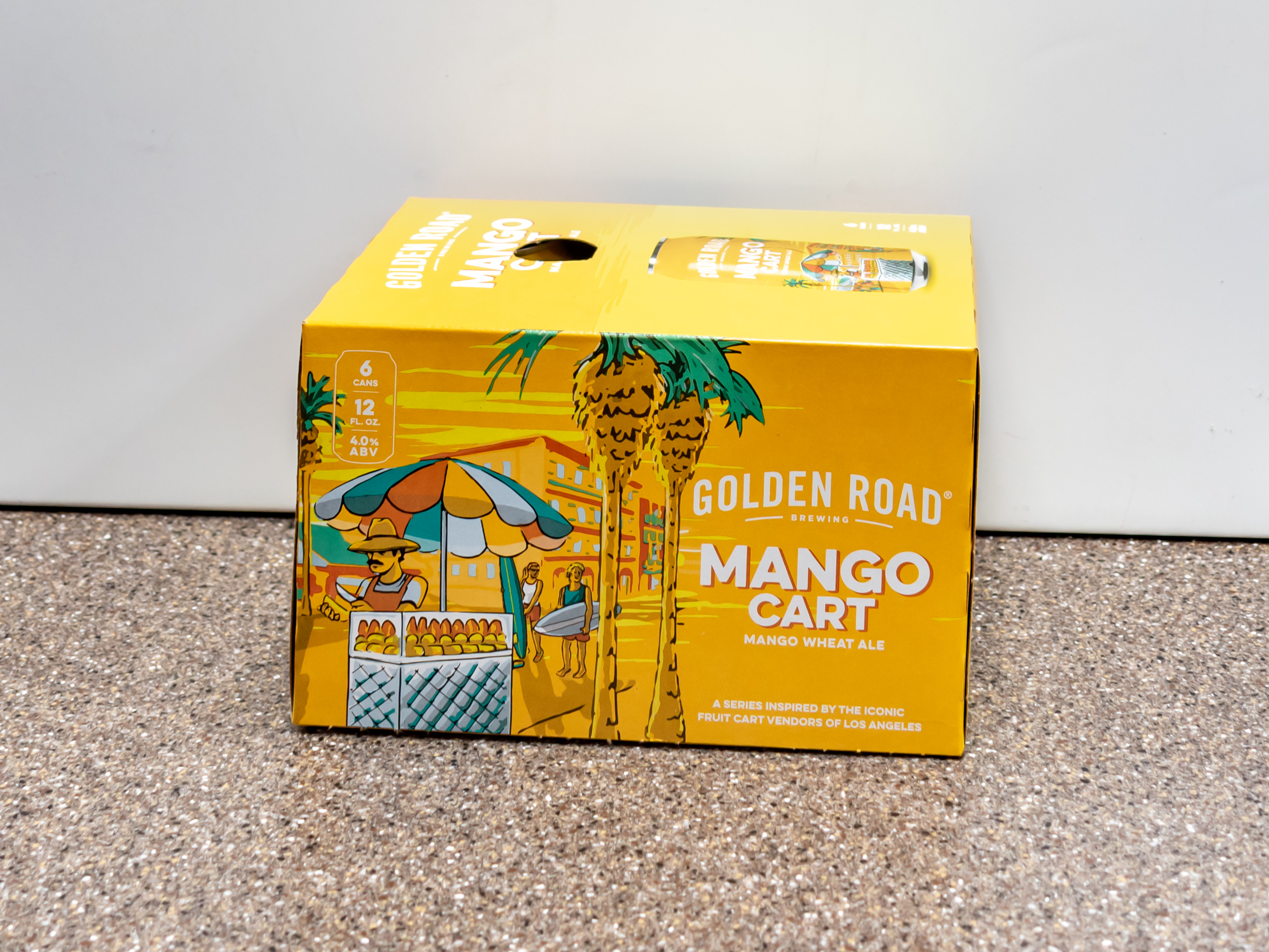 Order Golden Road Brewing Mango Cart Beer, 12 oz. Can 6 Pack food online from Kangaroo Food Mart store, Cathedral City on bringmethat.com