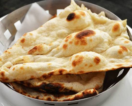 Order Plain Naan food online from Taste Of India store, Albuquerque on bringmethat.com
