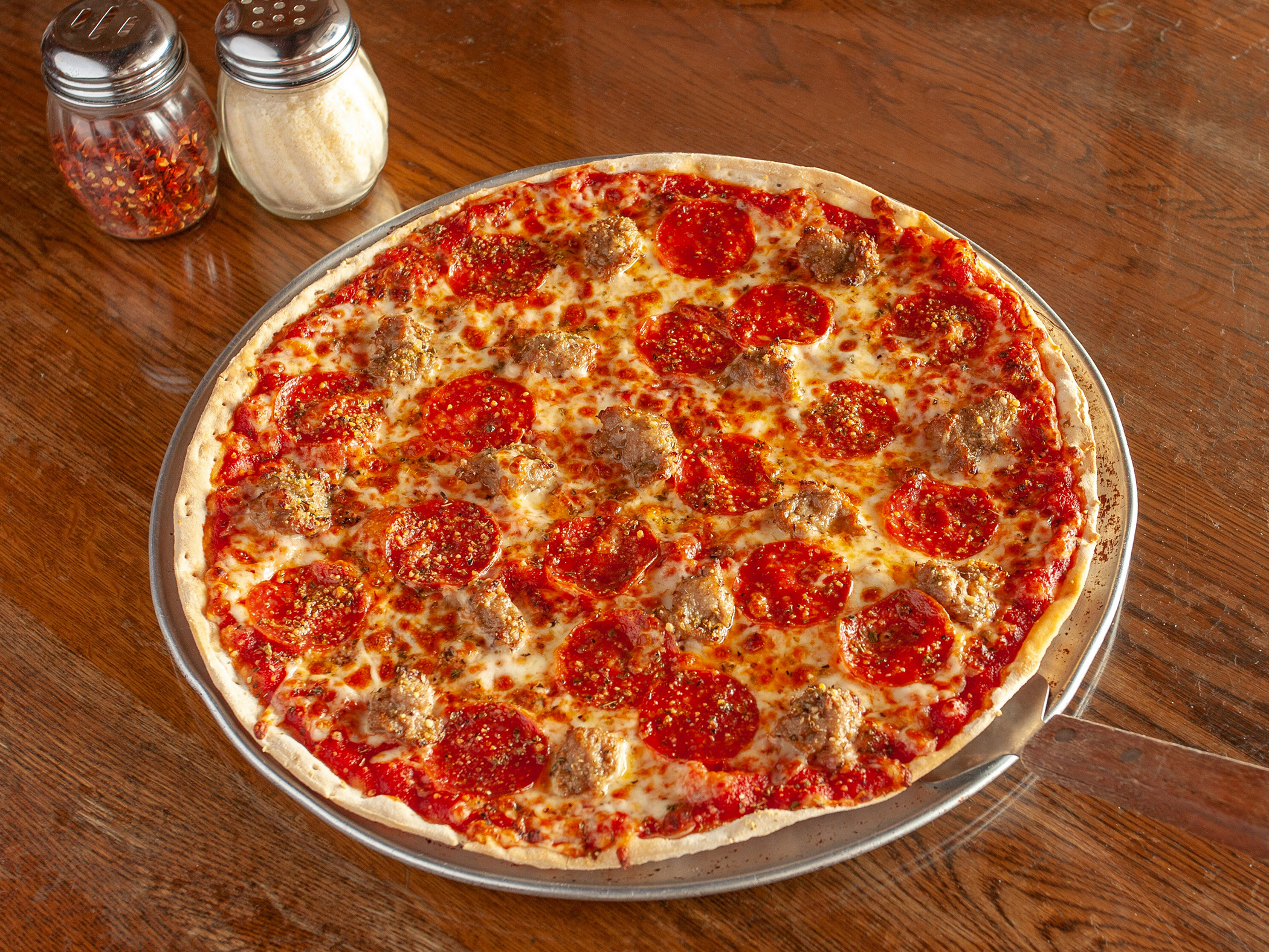 Order Meat Lover's Pizza food online from Rizzo's Bar and Grill store, Wentzville on bringmethat.com