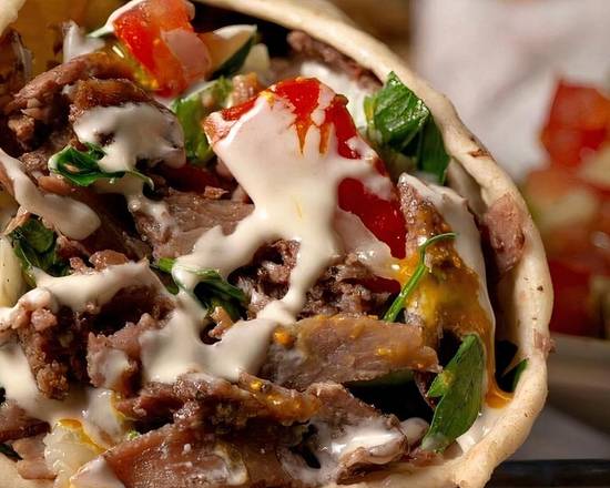 Order Laffa Chicken Shawarma In Bedouin Flatbread food online from Java Dive Organic Cafe store, Bee Cave on bringmethat.com