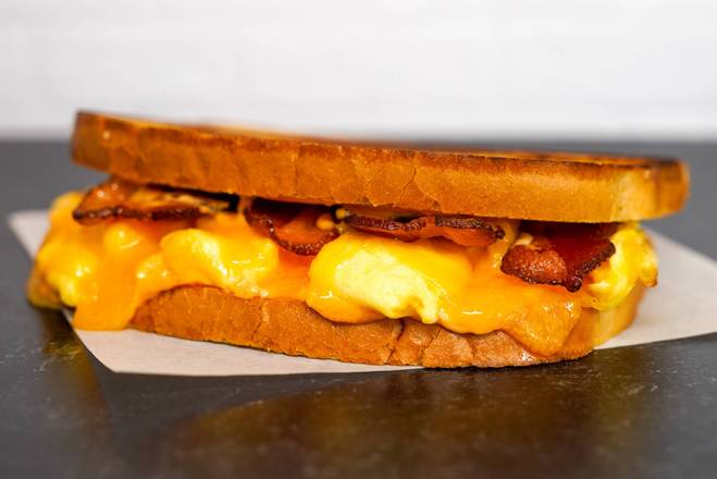 Order Texas Toast, Bacon, Egg, & Cheddar food online from Neighborhood Cafe store, Hopewell on bringmethat.com
