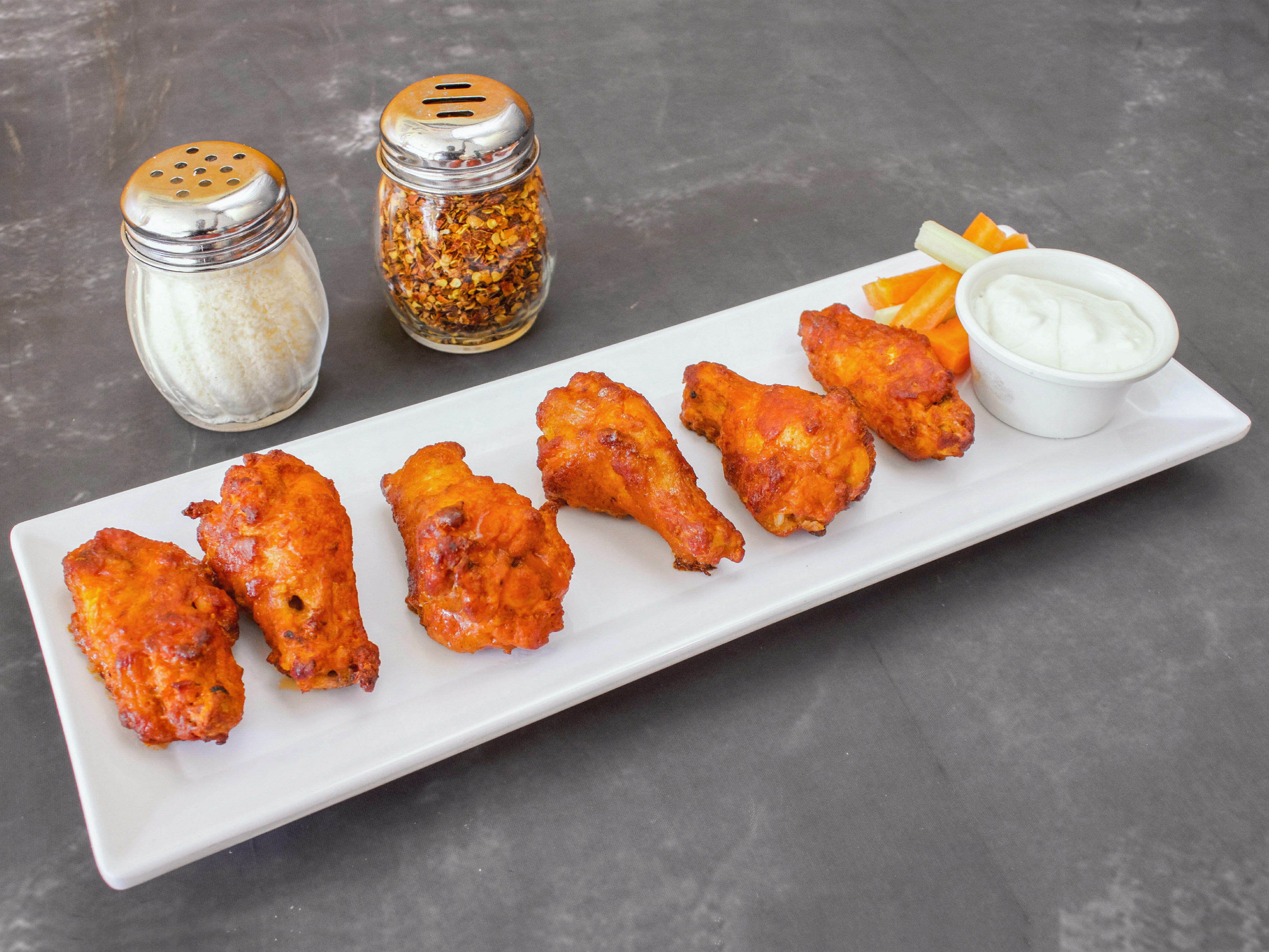Order Buffalo Wings food online from Eagle Pizzeria store, San Francisco on bringmethat.com