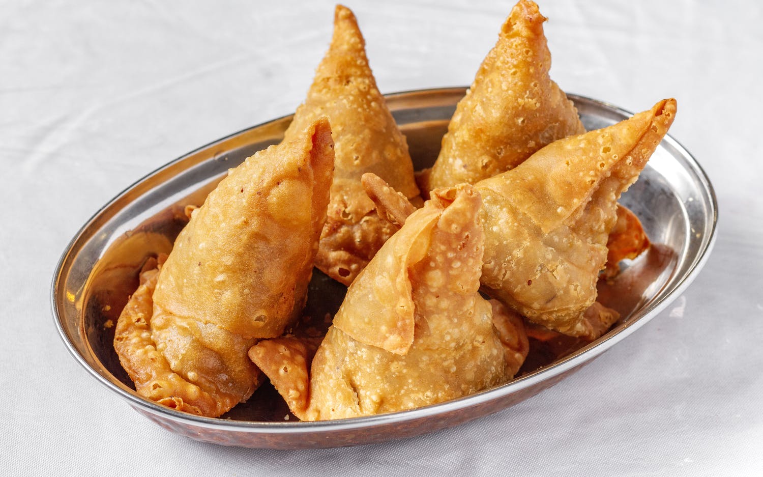 Order Samosa food online from Halal Pizza store, Woodlawn on bringmethat.com