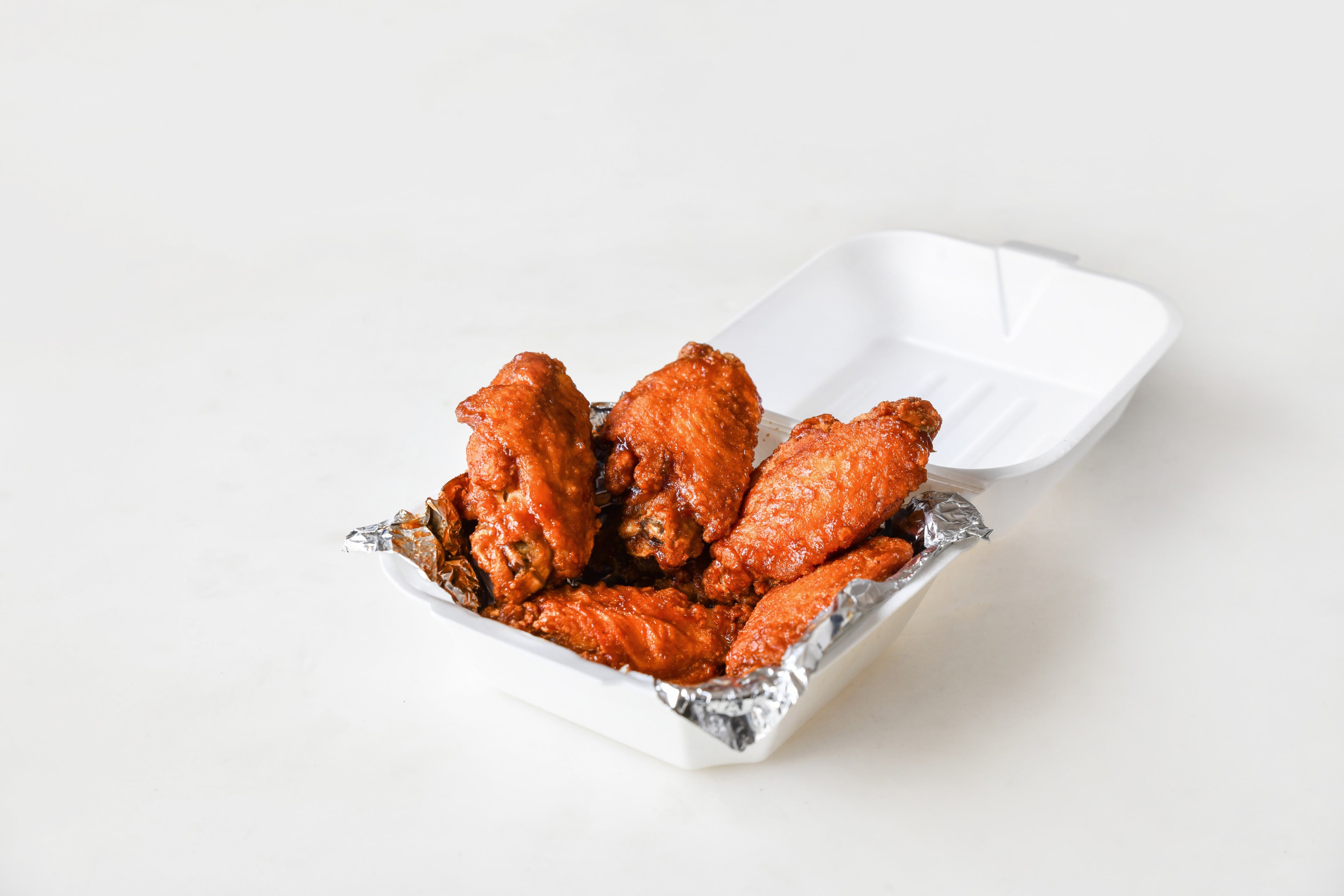 Order Famous Wings - 6 Pieces food online from Nick Deli store, Rochester on bringmethat.com