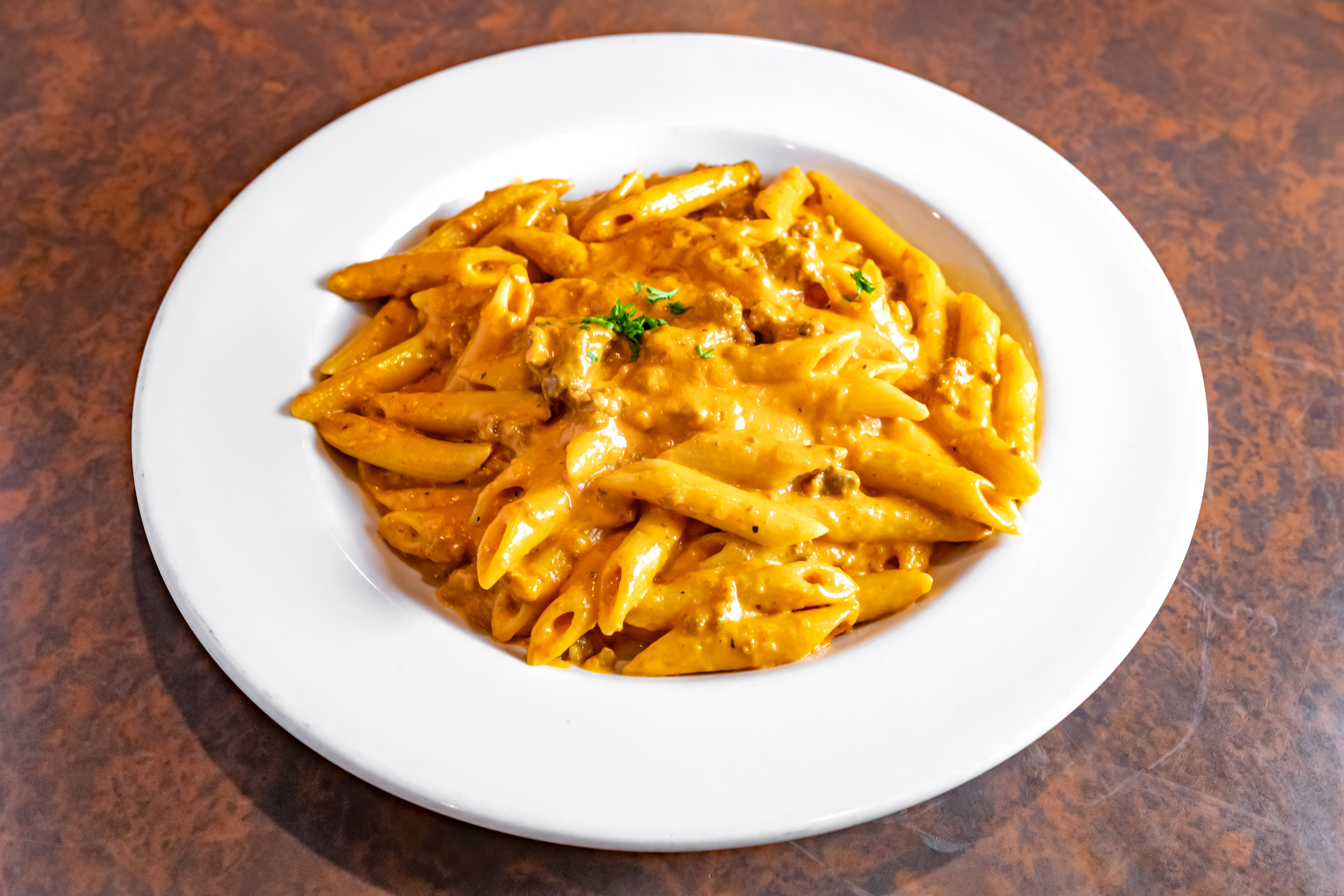 Order Ziti Bolognese - Pasta food online from Paisano's store, Benbrook on bringmethat.com