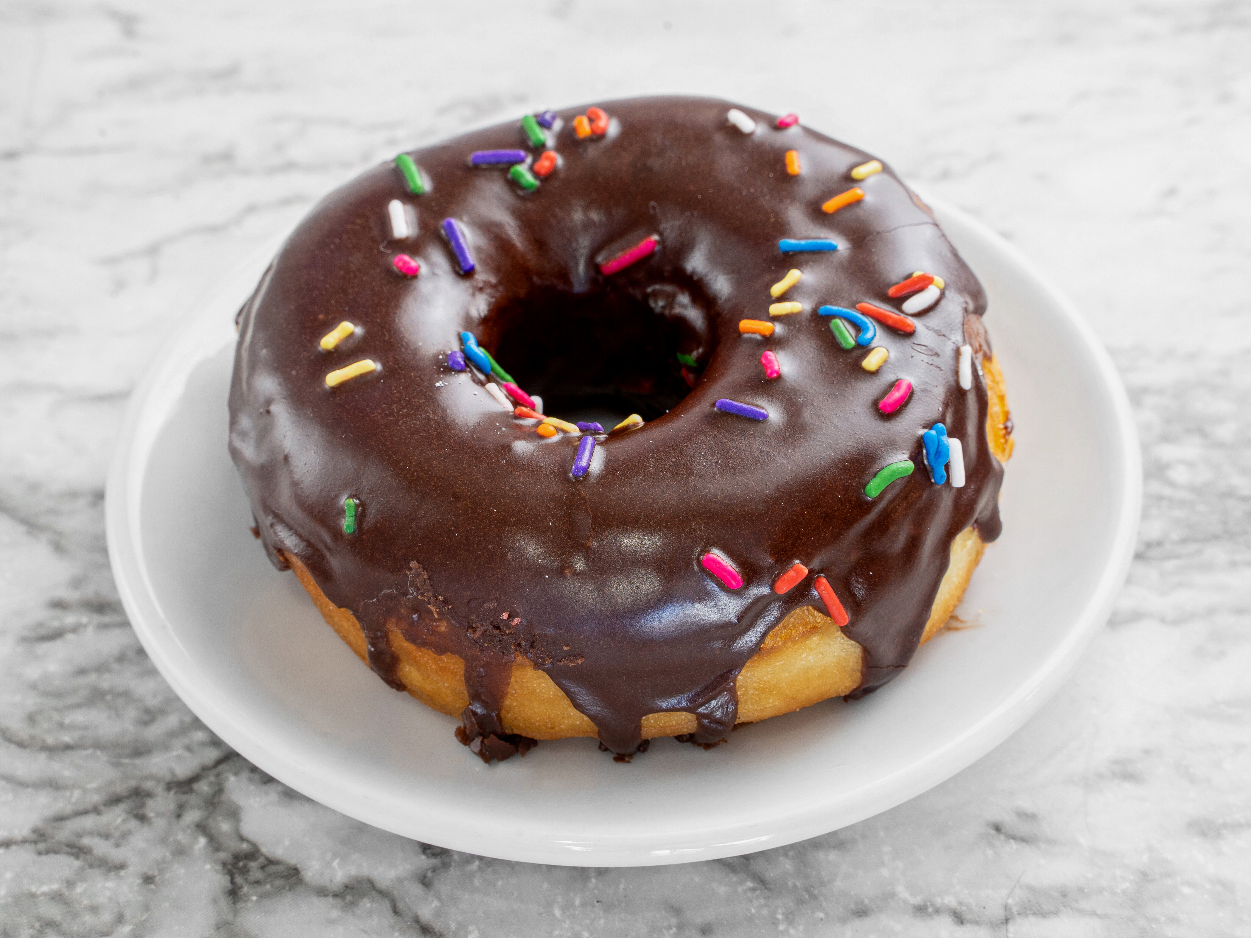 Order French Chocolate Glazed Donut food online from Sugar Donuts store, Charlotte on bringmethat.com