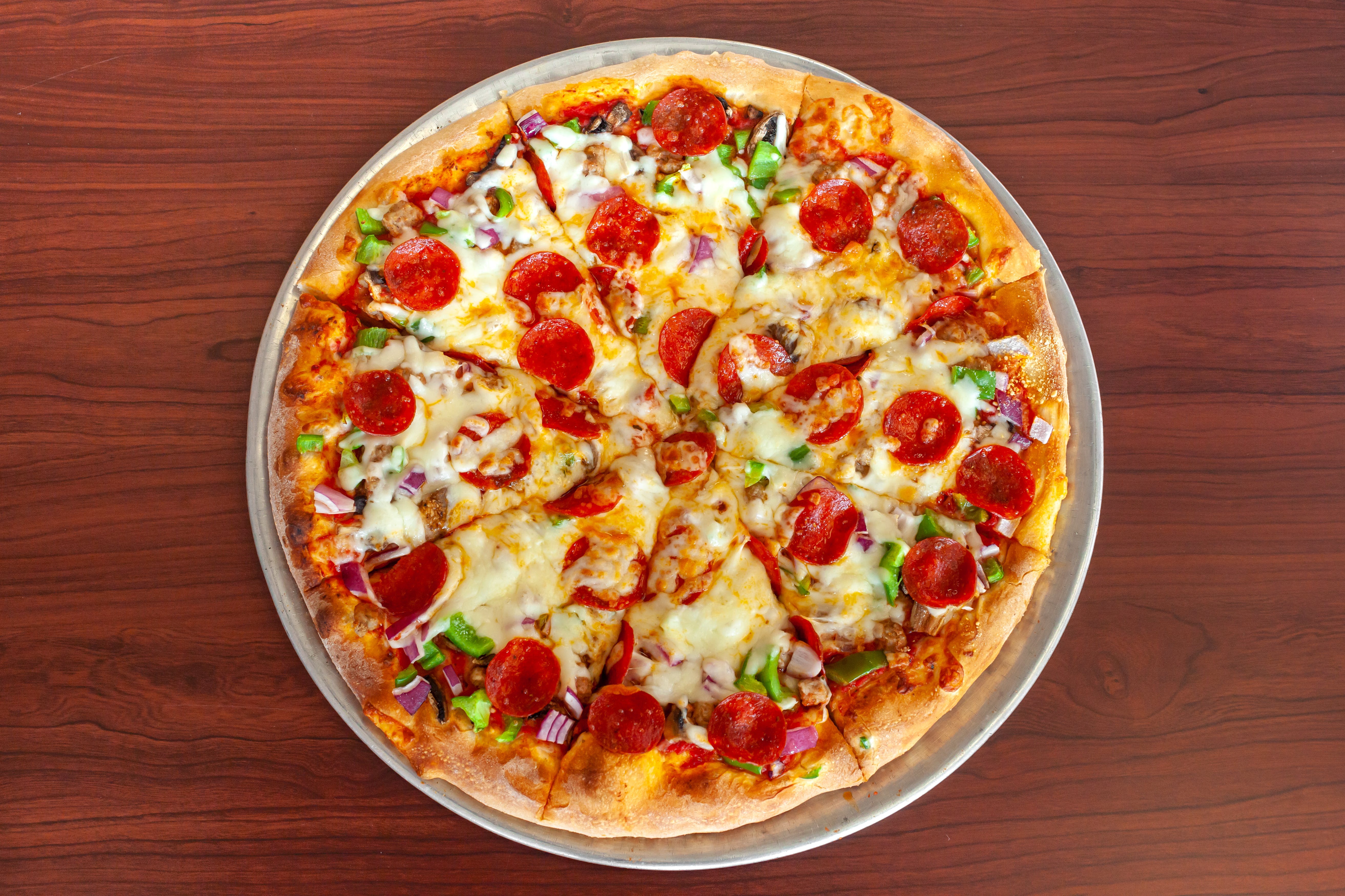 Order Combination Pizza - Small 12" (8 Slices) food online from Apollos Pizza store, Richmond on bringmethat.com