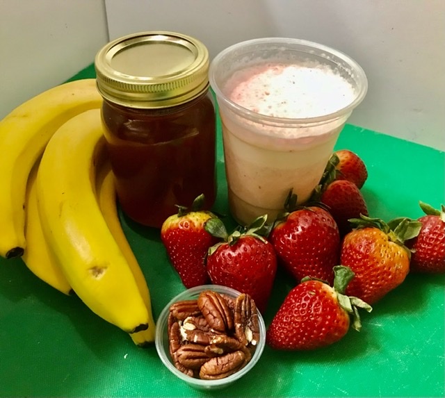 Order #6. Strawberry, Nuts, Banana, Honey Milkshake food online from El Papayon store, Ontario on bringmethat.com
