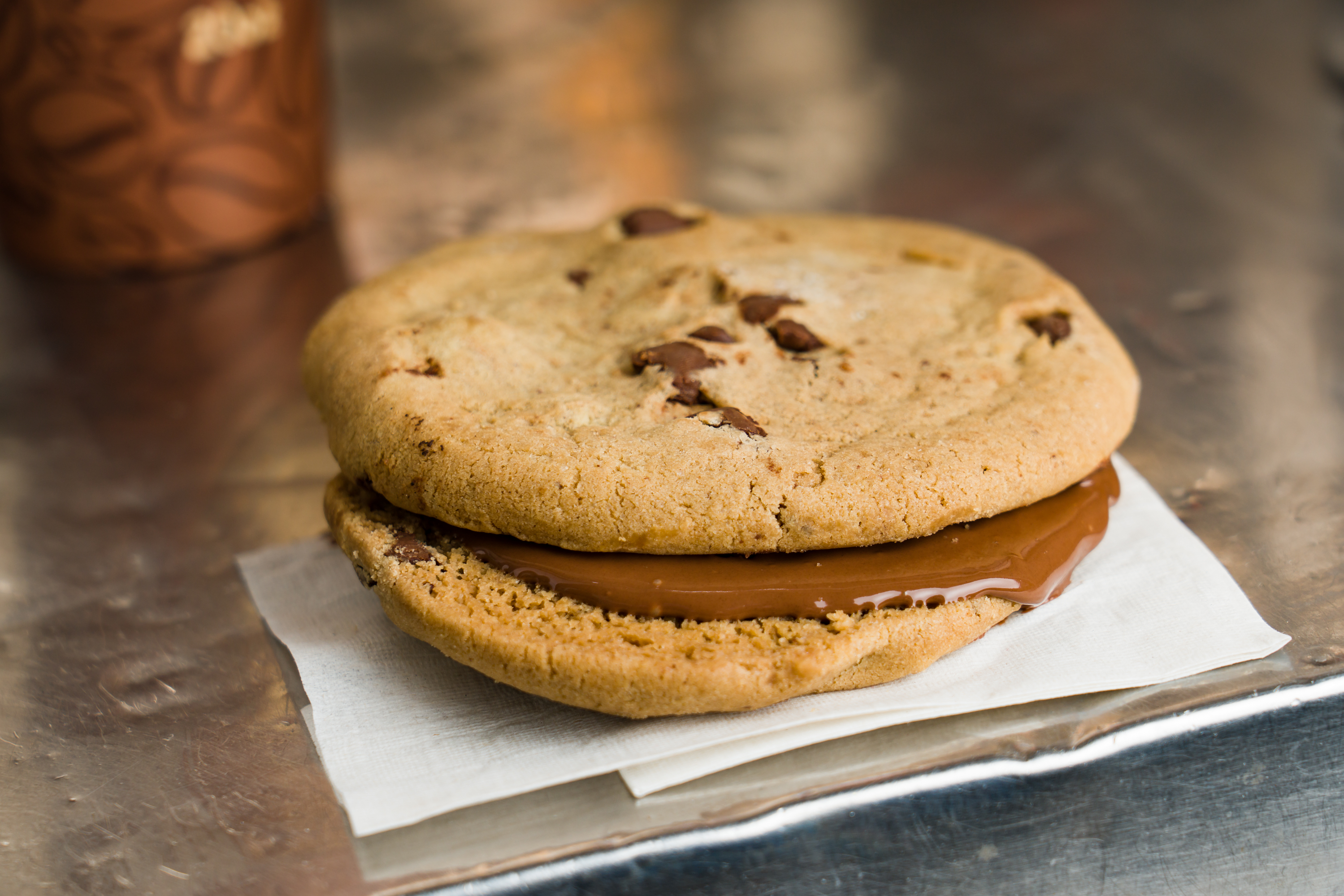 Order Chocolate Chip Cookie Nutella Sandwich food online from Ray's Candy Store store, New York on bringmethat.com