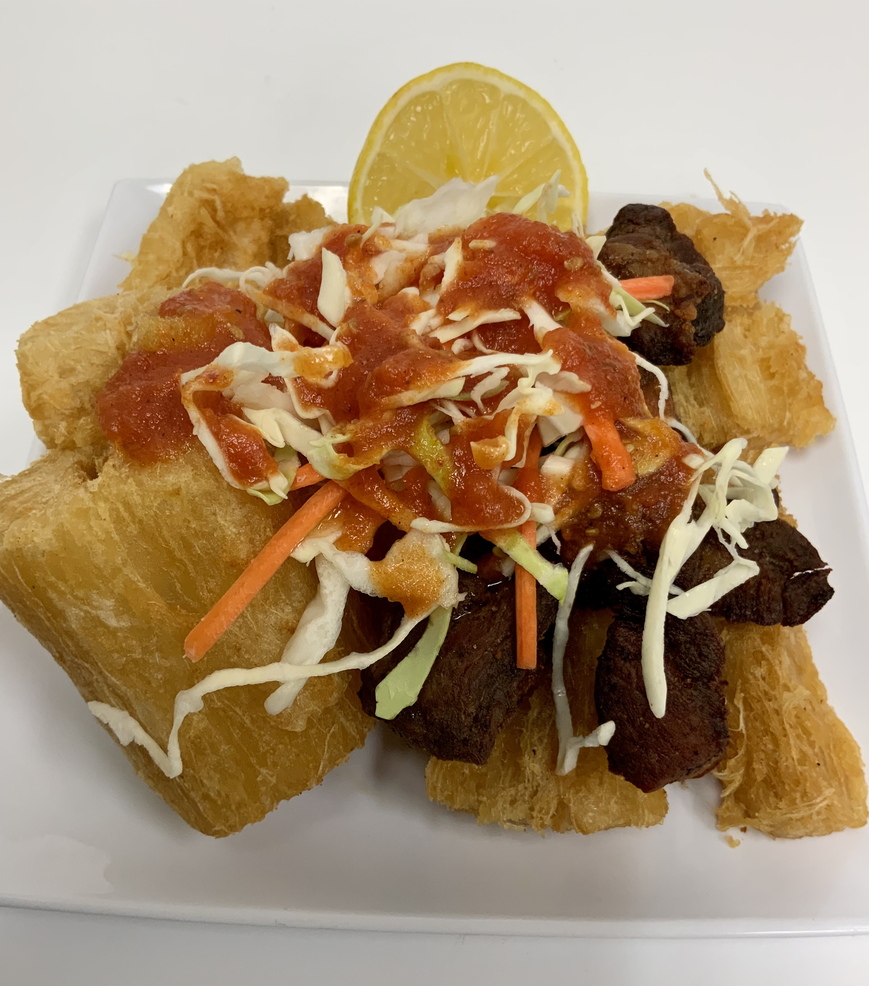 Order B4. Yuca Can Chicharron food online from Guana Cafe store, Irving on bringmethat.com
