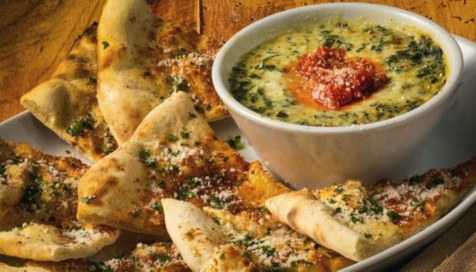 Order Spinach & Artichoke Dip - Appetizer food online from Brio Tuscan Grille store, Dayton on bringmethat.com