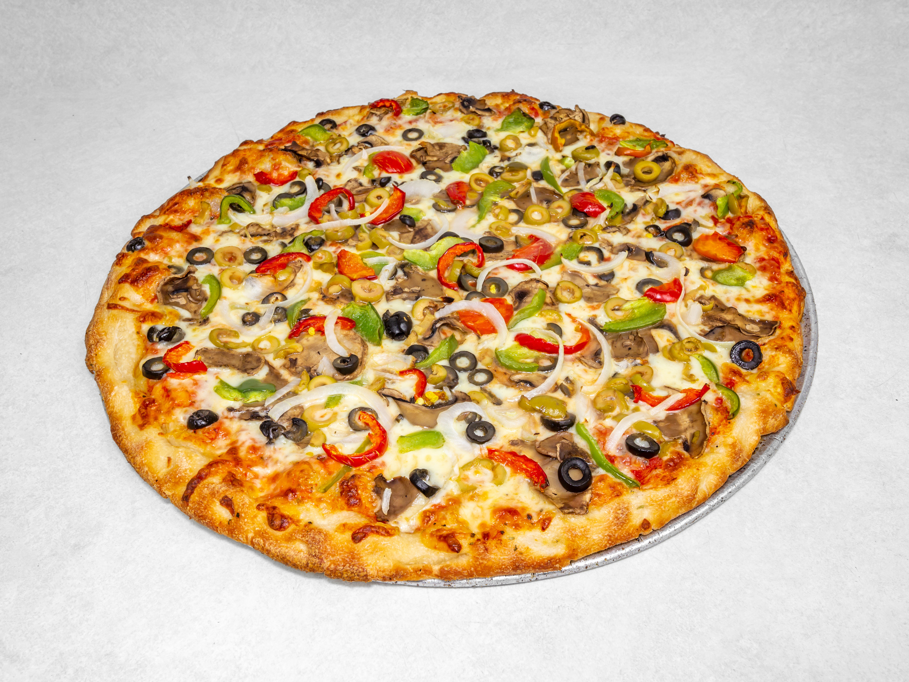 Order Deluxe Veggie Pizza food online from Mister Pizza store, Buffalo on bringmethat.com