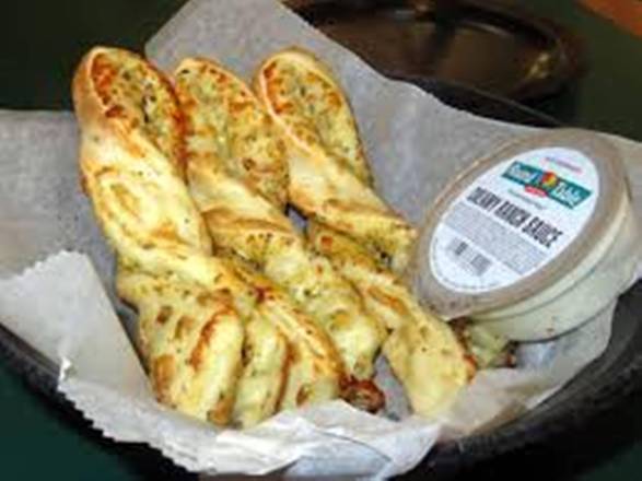 Order Garlic Parmesan Twists™ (3 Twists) food online from Round Table Pizza store, Millbrae on bringmethat.com