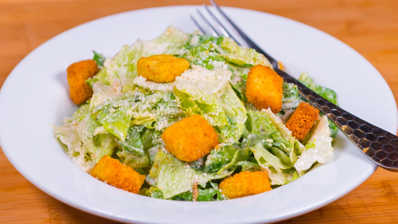 Order Caesar Side Salad food online from Smokey Bones Barbeque & Grill store, Grove City on bringmethat.com