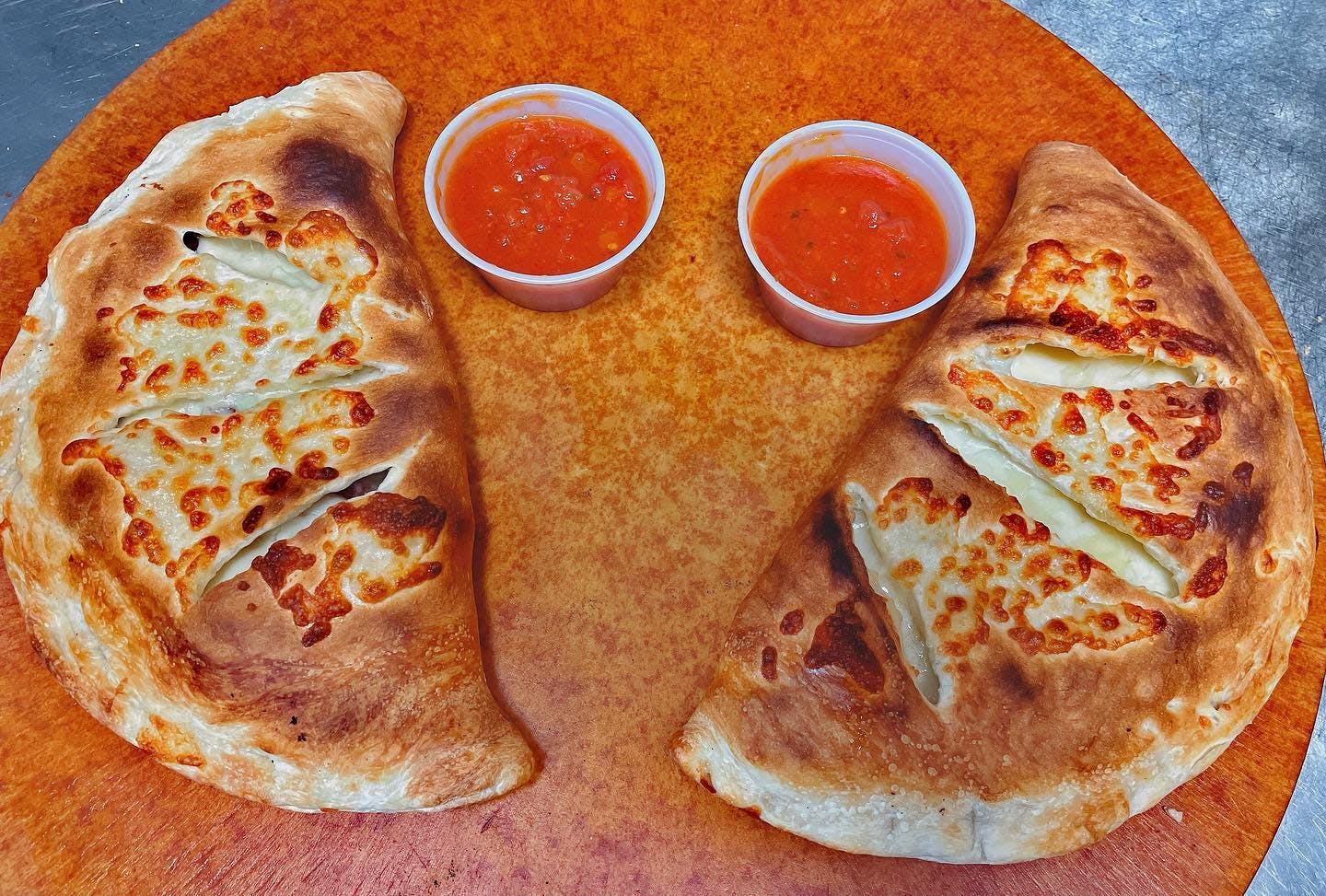Order Steak & Cheese Calzone - Small food online from Totis Pizza & Grill store, Pawtucket on bringmethat.com