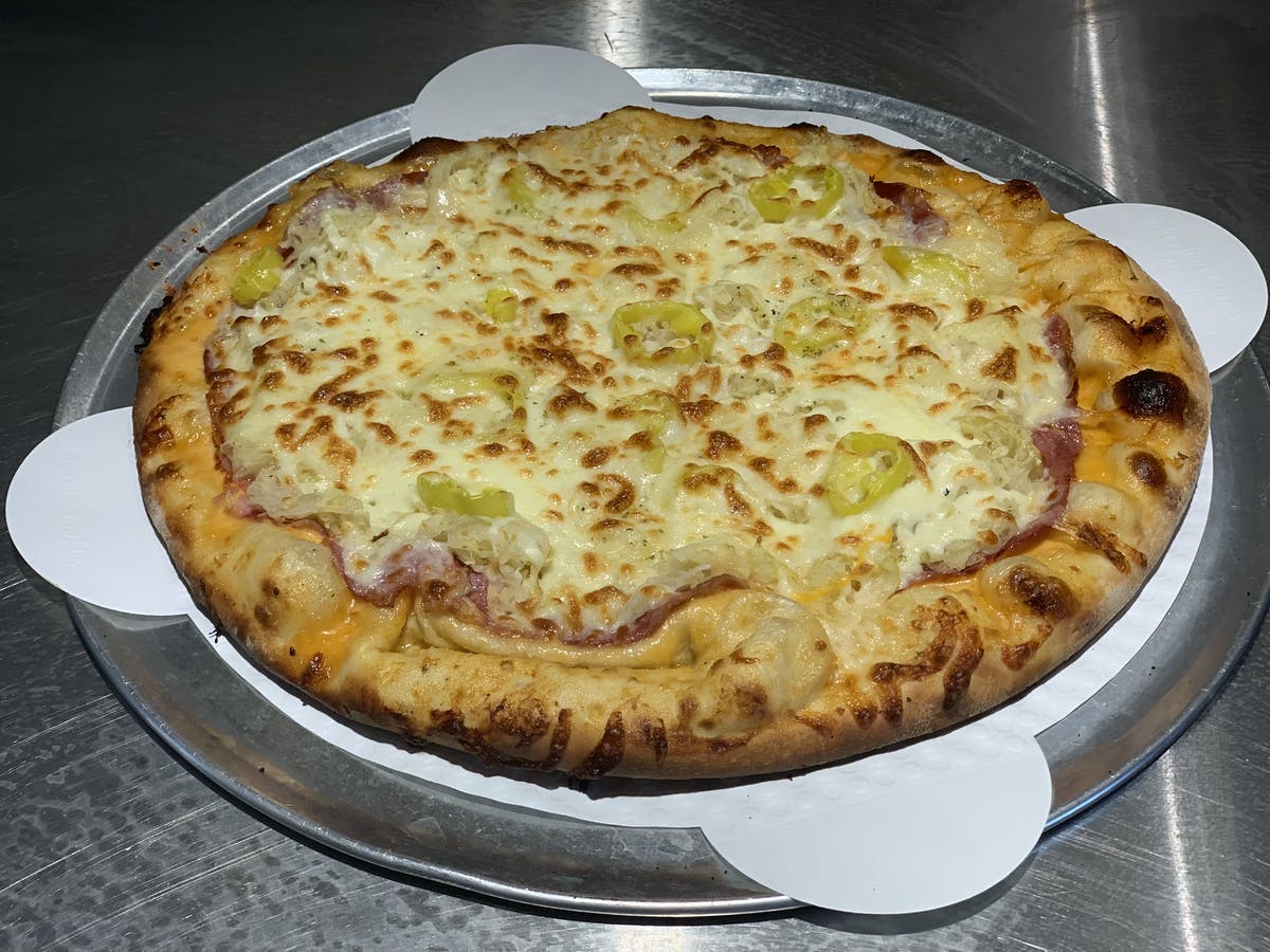 Order The Reuben Pizza - Medium 14" food online from Kato Pizzeria store, Mankato on bringmethat.com