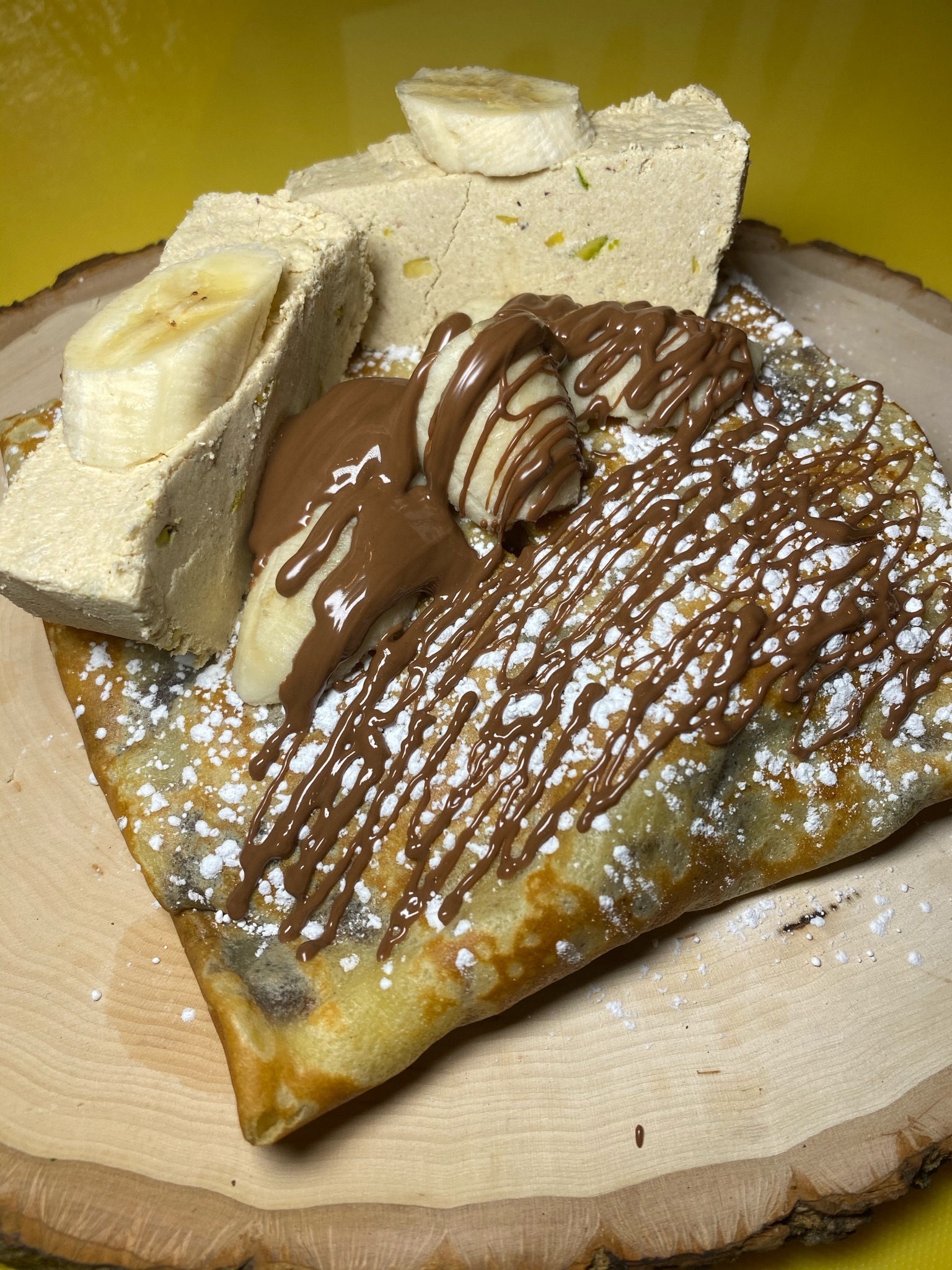 Order Halva with Banana and Nutella Crepe food online from Creperie store, New York on bringmethat.com