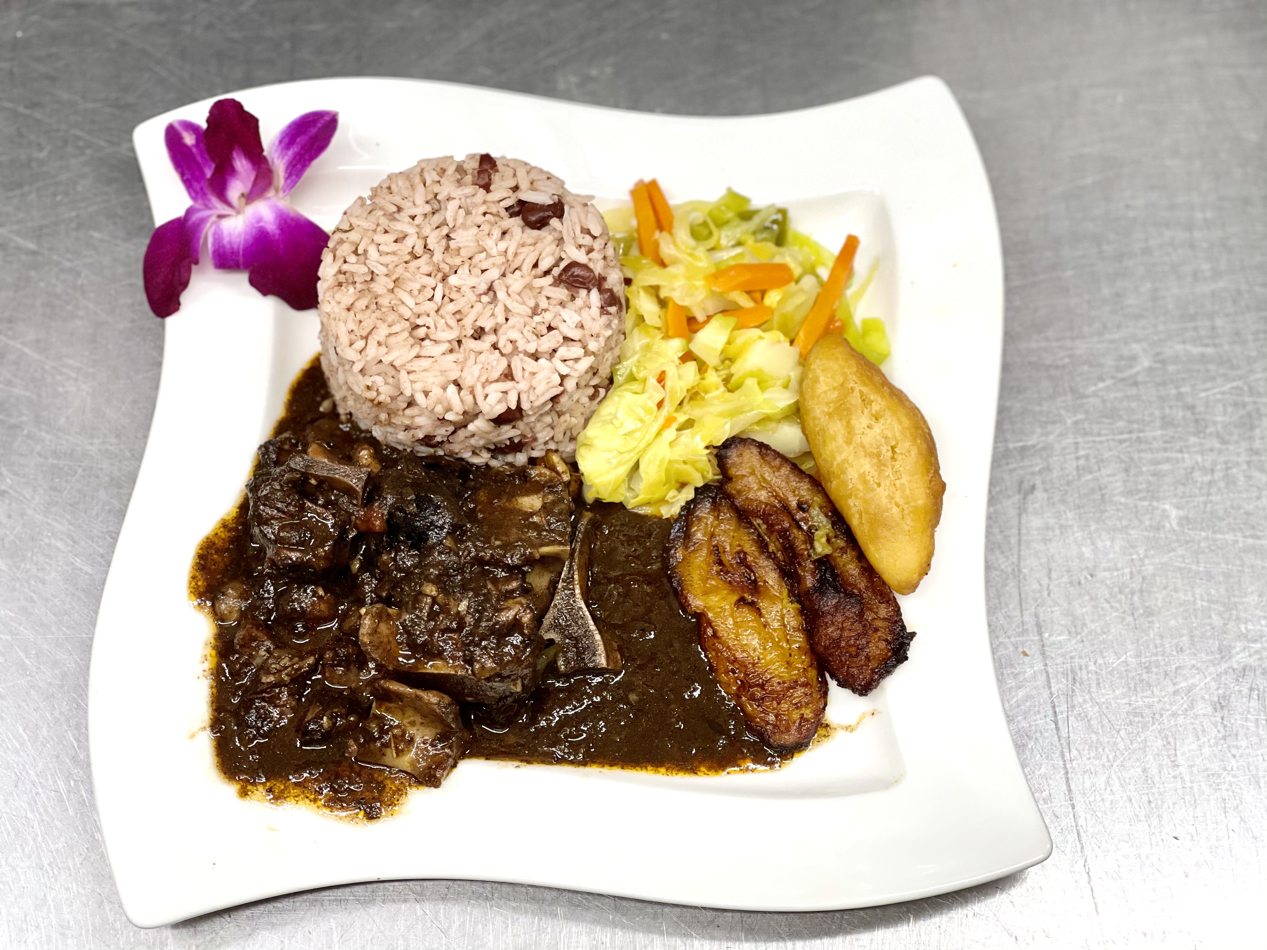 Order Marley's Fav Oxtail food online from One876 Caribbean Restaurant store, Chatsworth on bringmethat.com