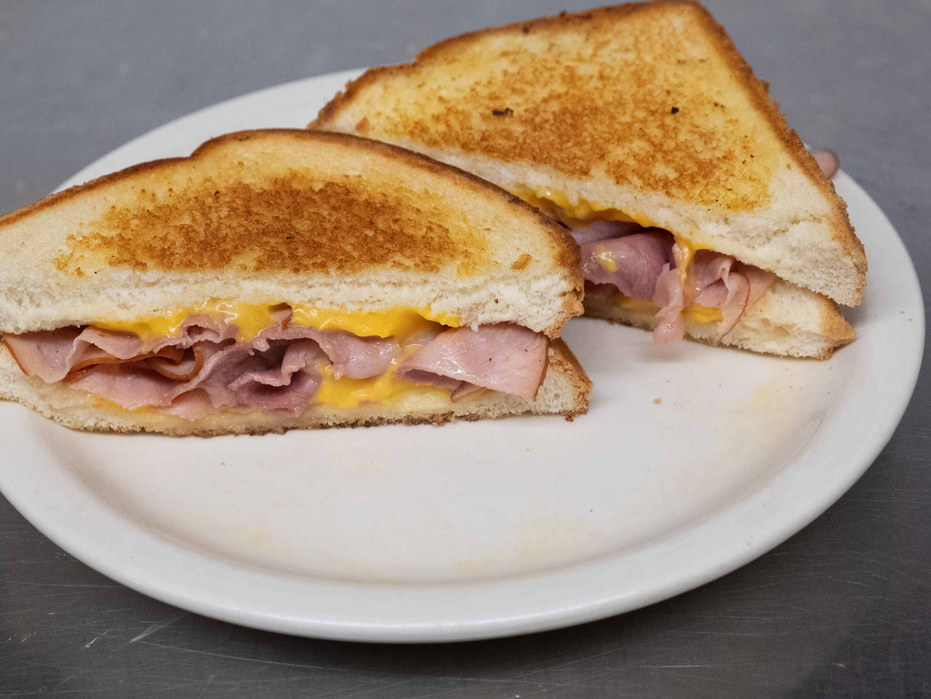 Order Grilled Ham and Cheese Sandwich food online from Monroe St Diner store, Toledo on bringmethat.com