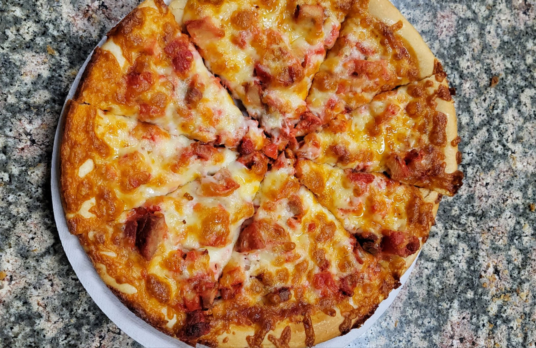 Order Chicken Tikka Pizza - 10" food online from Singas Pizza store, Hicksville on bringmethat.com
