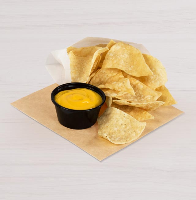 Order Chips and Nacho Cheese Sauce food online from Taco Bell store, Rome on bringmethat.com