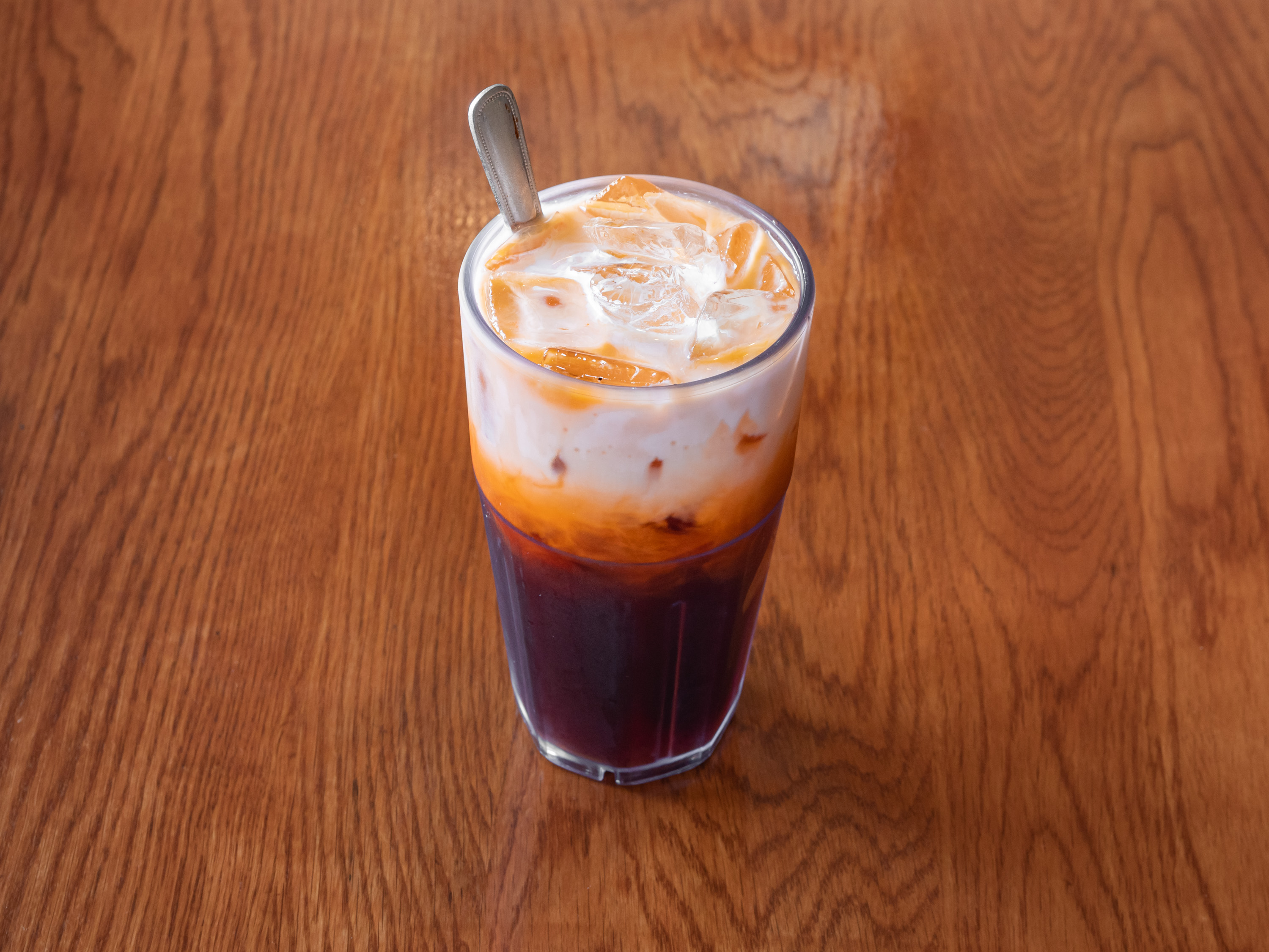 Order Thai's Iced Tea food online from Pho Hoang Inc store, Austin on bringmethat.com