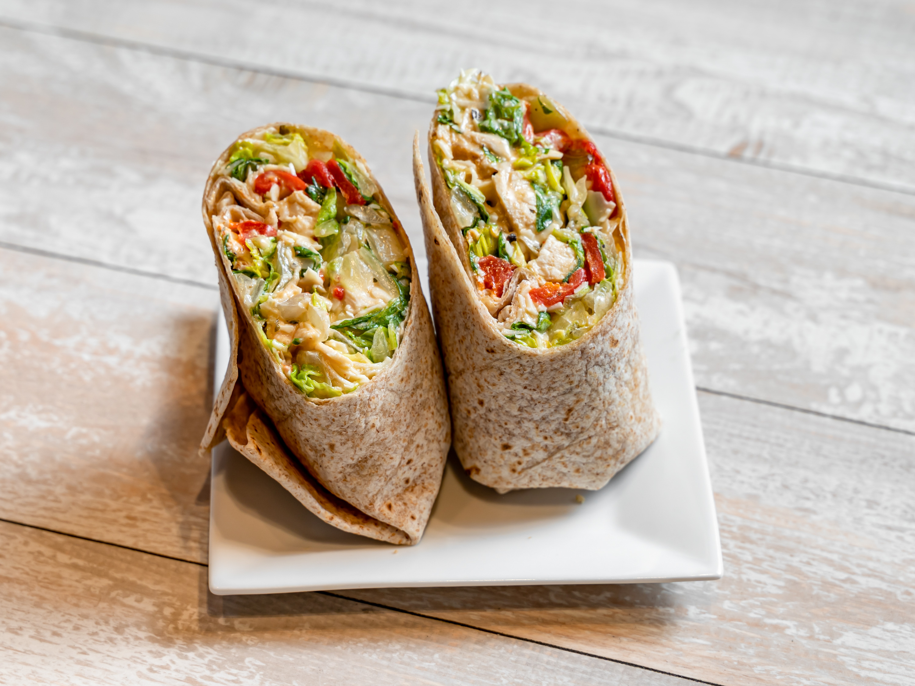 Order Chicken Caesar Wrap food online from Cafe Metro store, New York on bringmethat.com