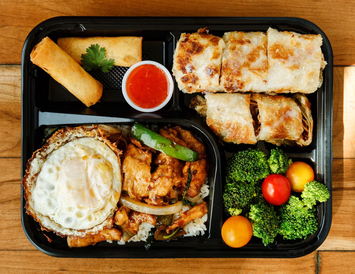 Order Spicy Basil Chicken Bento Box food online from Herbs Thai Bistro store, New York on bringmethat.com