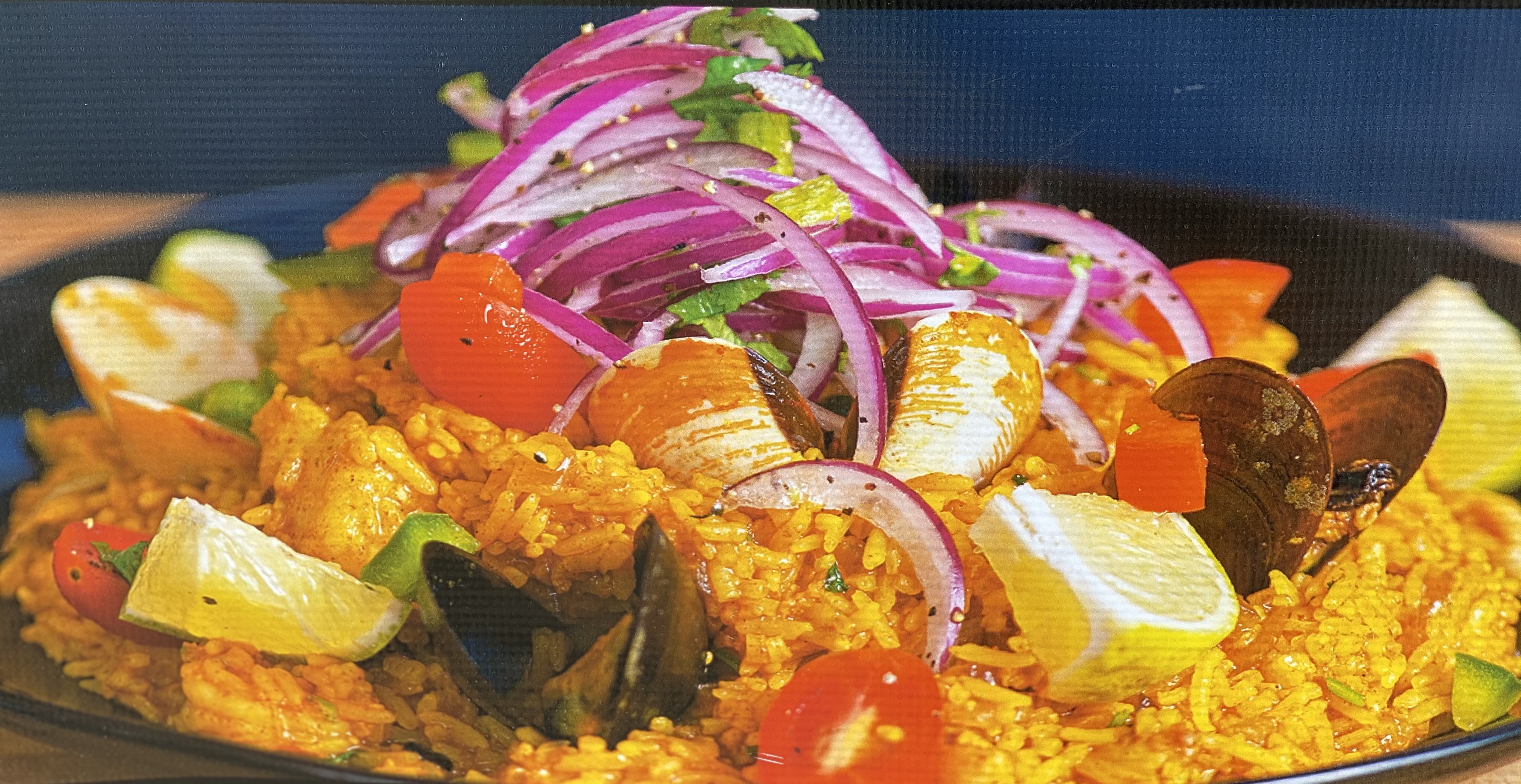 Order Paella food online from El Bitute Peruvian Cuisine store, The Woodlands on bringmethat.com