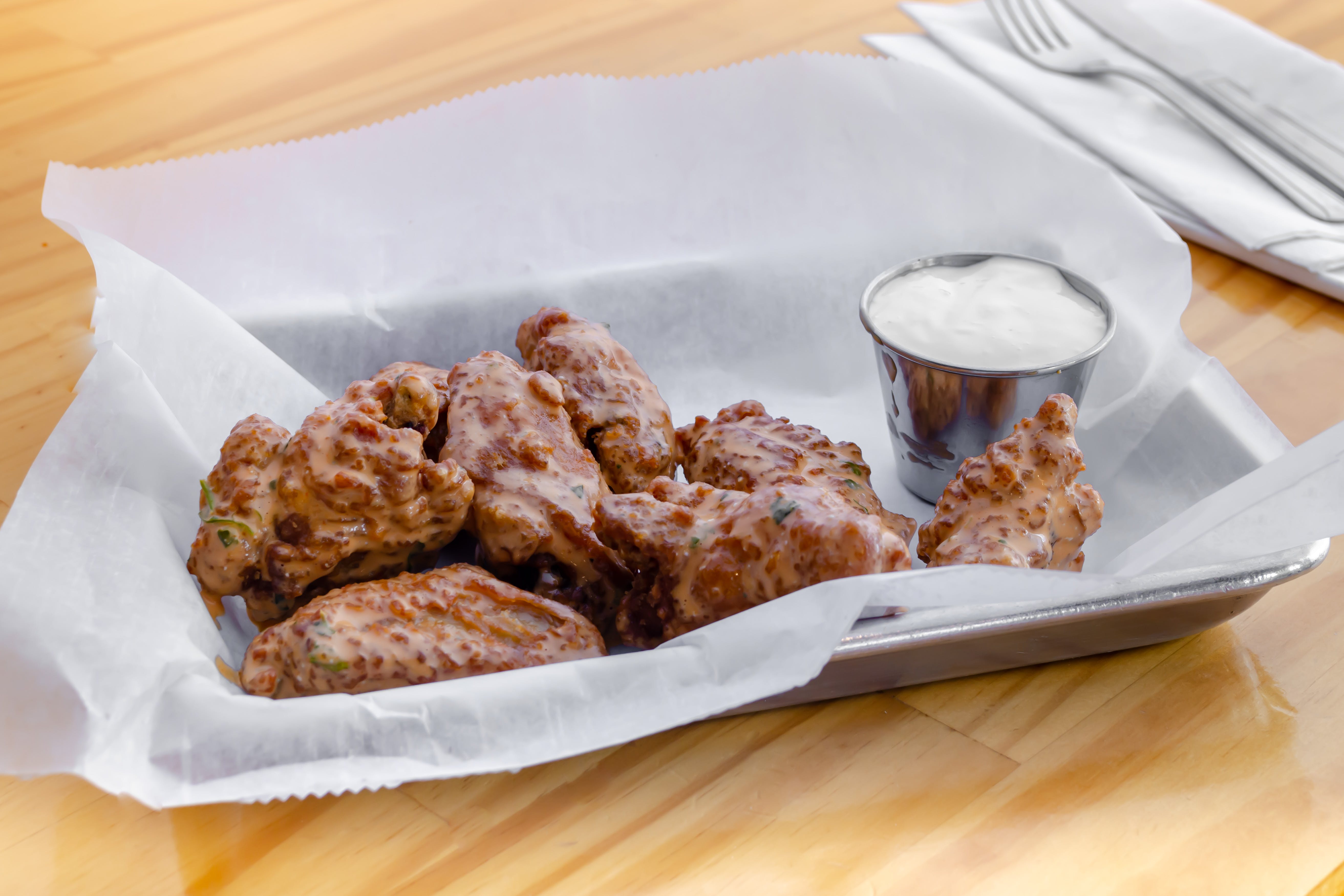 Order Buffalo Wings - 8 Pieces food online from Urban Tomato store, Palisades Park on bringmethat.com