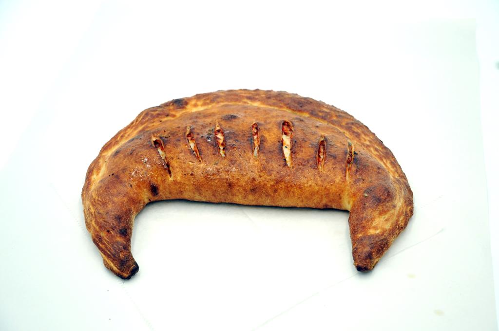 Order Ham and Broccoli Calzone food online from Pizza Movers & Calzones store, Washington on bringmethat.com