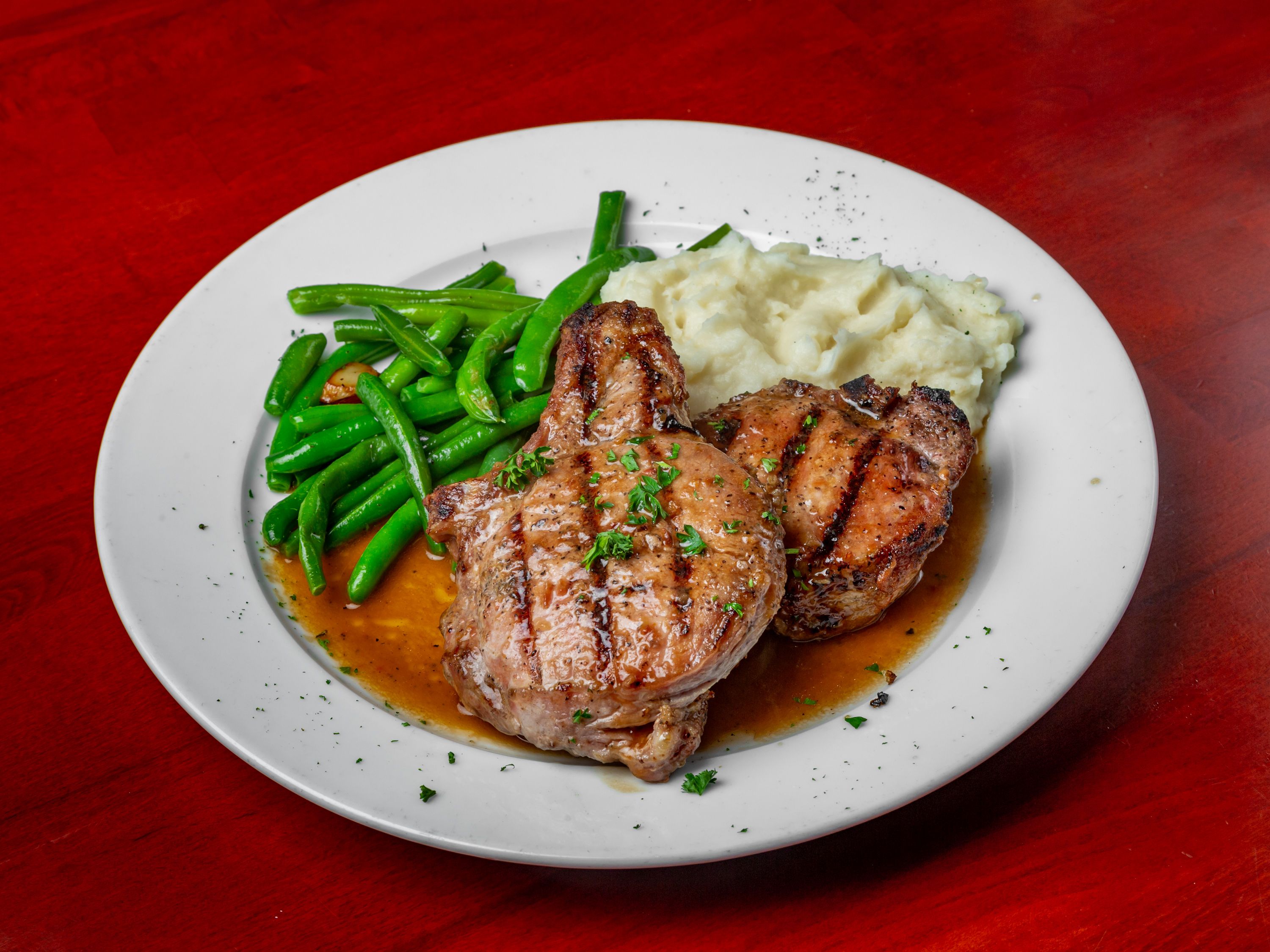 Order Pork Chops with Vinegar Peppers food online from Casa Mia Ristorante store, Yonkers on bringmethat.com