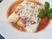 Order Manicotti Dinner food online from Randy's Pizza store, Raleigh on bringmethat.com