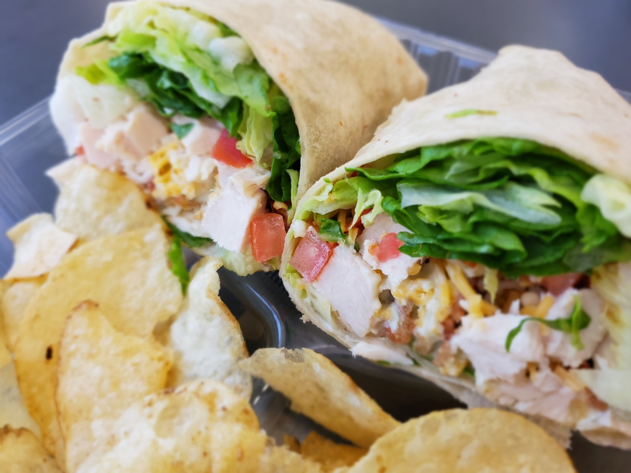 Order Chicken Ranch Wrap food online from Cafe Artys II store, Newport Beach on bringmethat.com