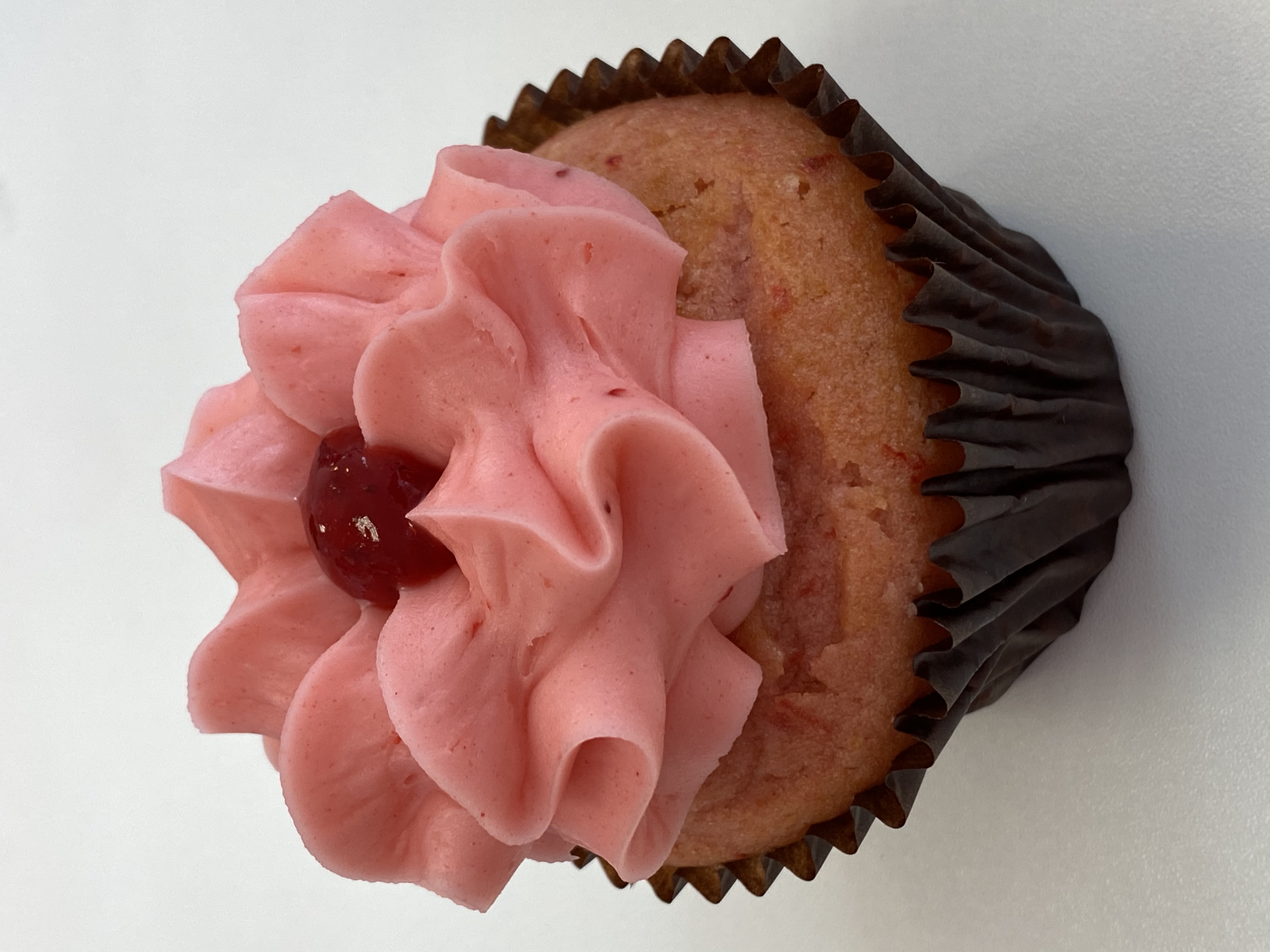 Order Strawberry Cupcake food online from Smallcakes store, Richmond on bringmethat.com