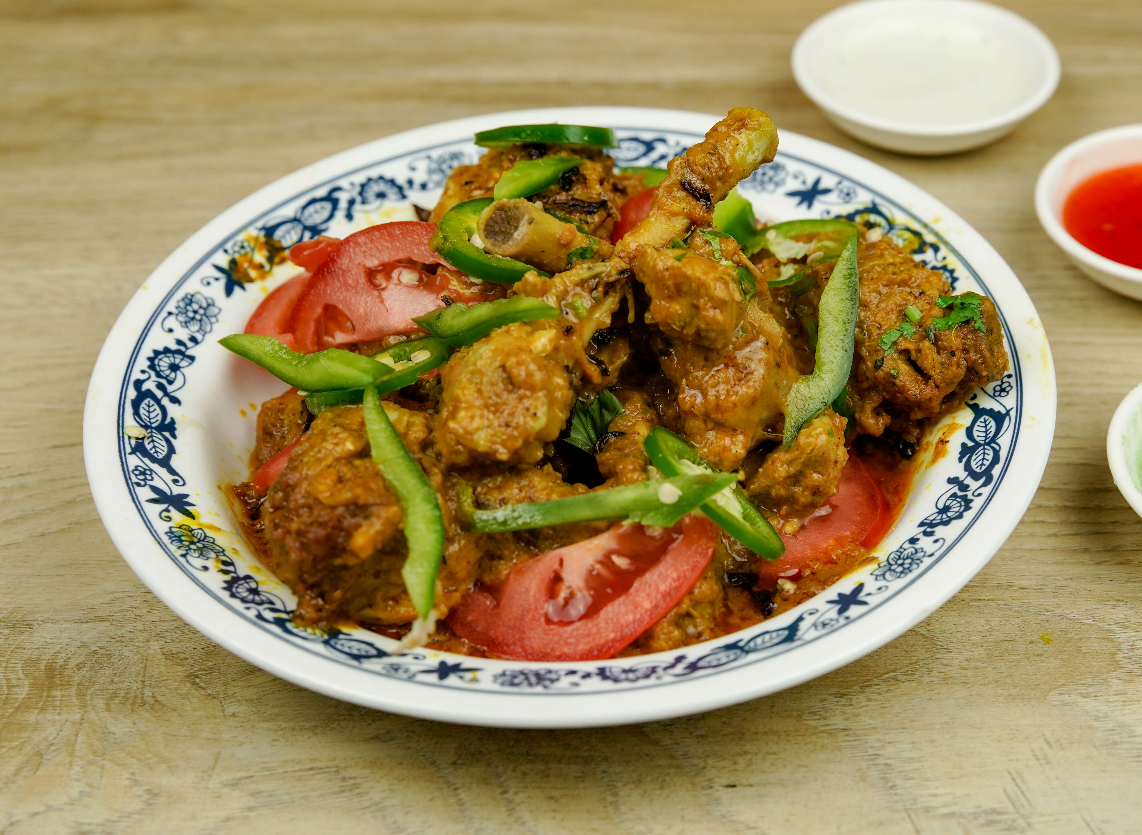 Order Chicken Karahi food online from Phayul Restaurant store, Queens on bringmethat.com
