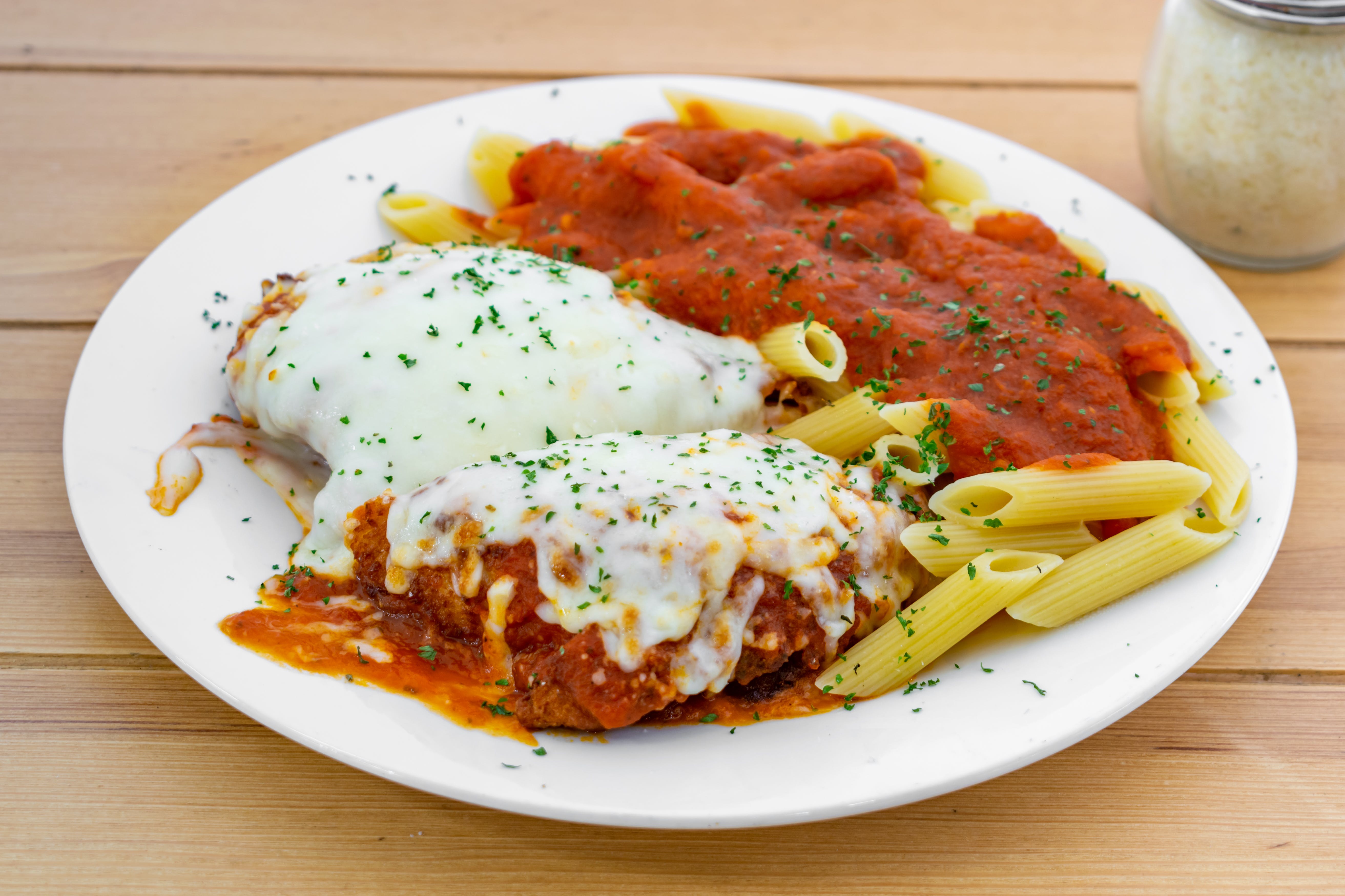 Order Chicken Parm - Entree food online from Fratelli Pizza & Coffee store, Wayne on bringmethat.com