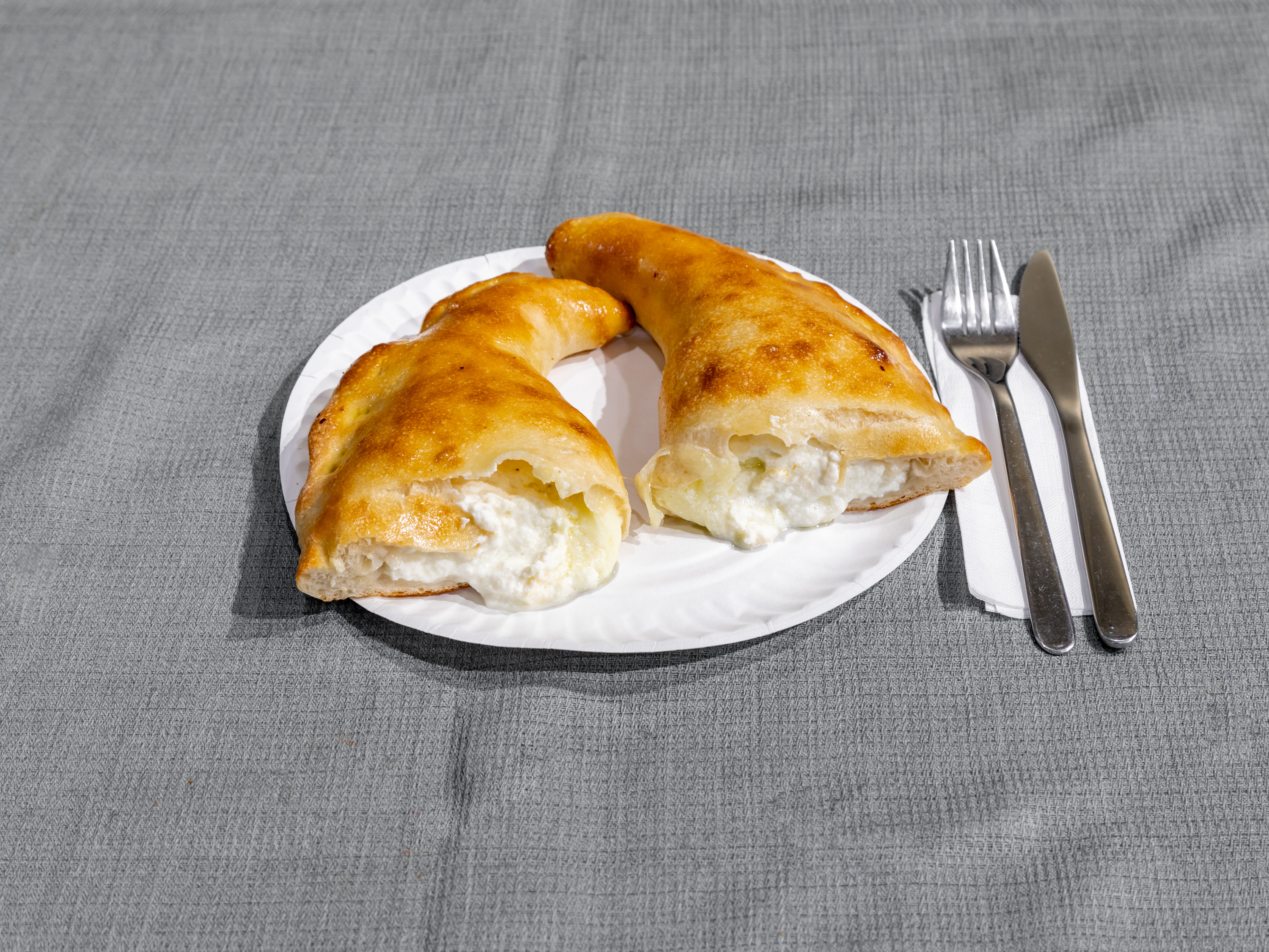 Order Calzone food online from Carnegie Pizza store, New York on bringmethat.com