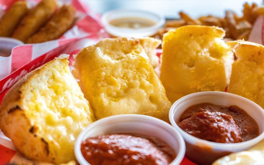 Order Garlic Cheese Bread - Appetizer food online from Jerry's Subs & Pizza store, Dunkirk on bringmethat.com