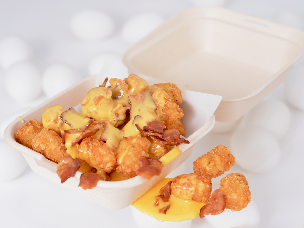 Order Bacon and Cheese Potato Tots food online from Breakfast Town store, Troy on bringmethat.com